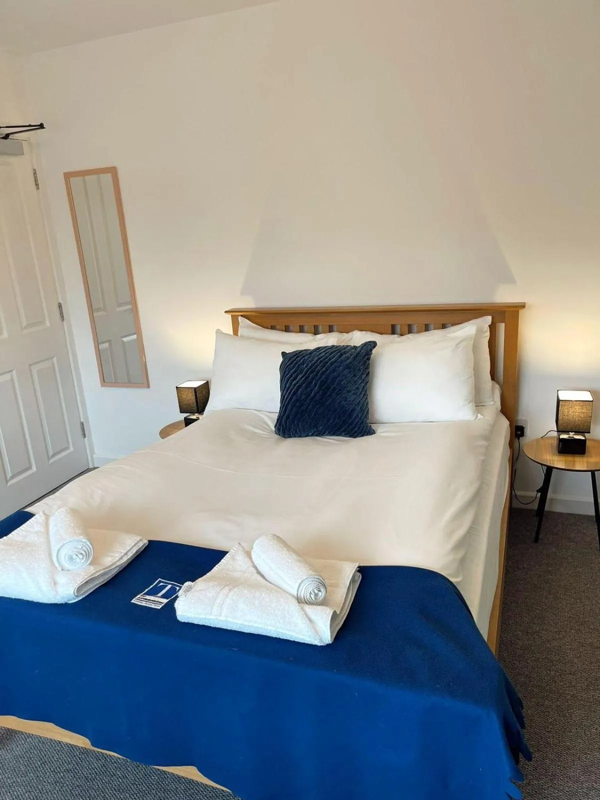 Bed in Cambridge Studios and Suites by Tas Accommodations