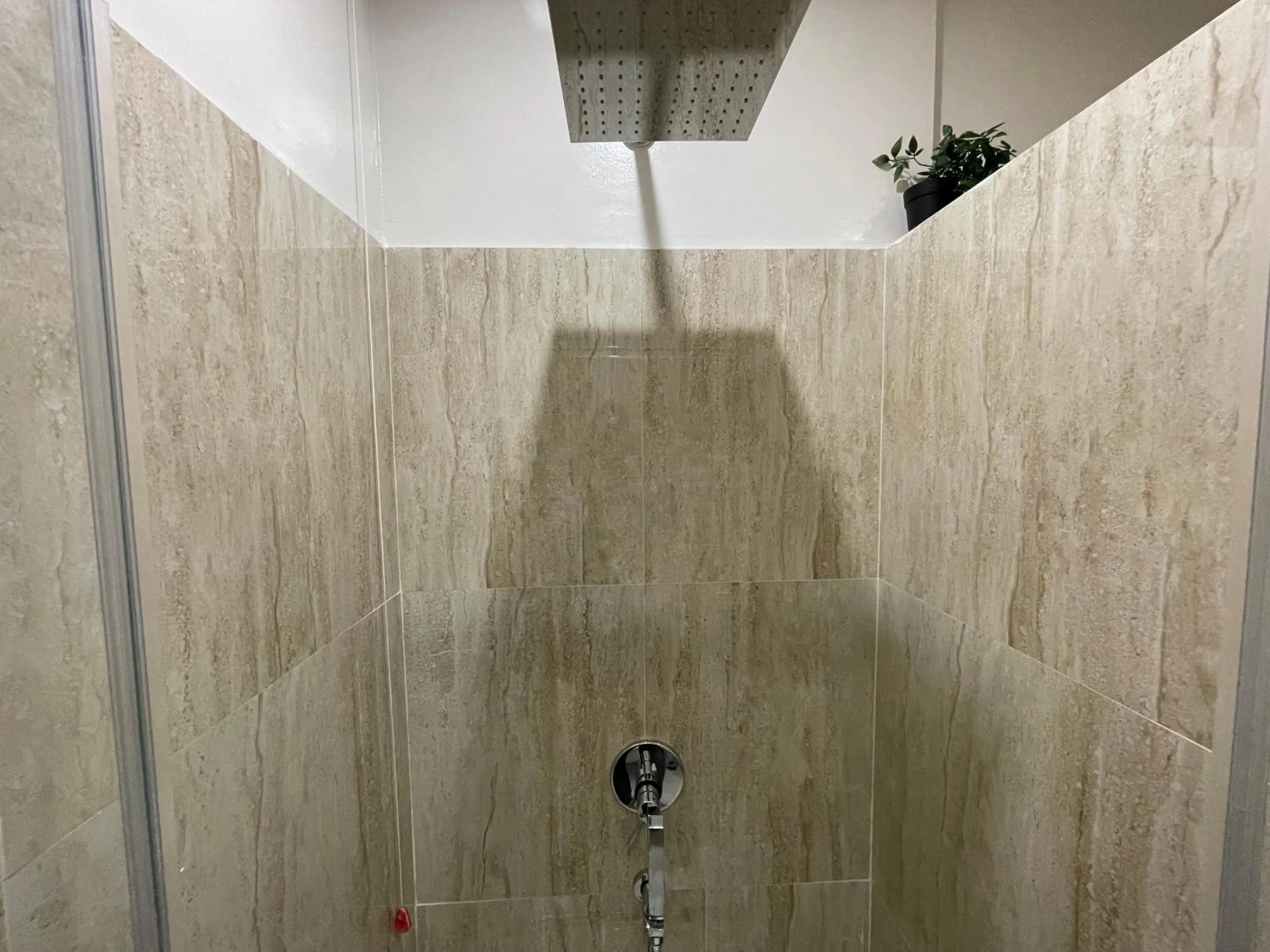 Shower in Quintus Luxury Suites