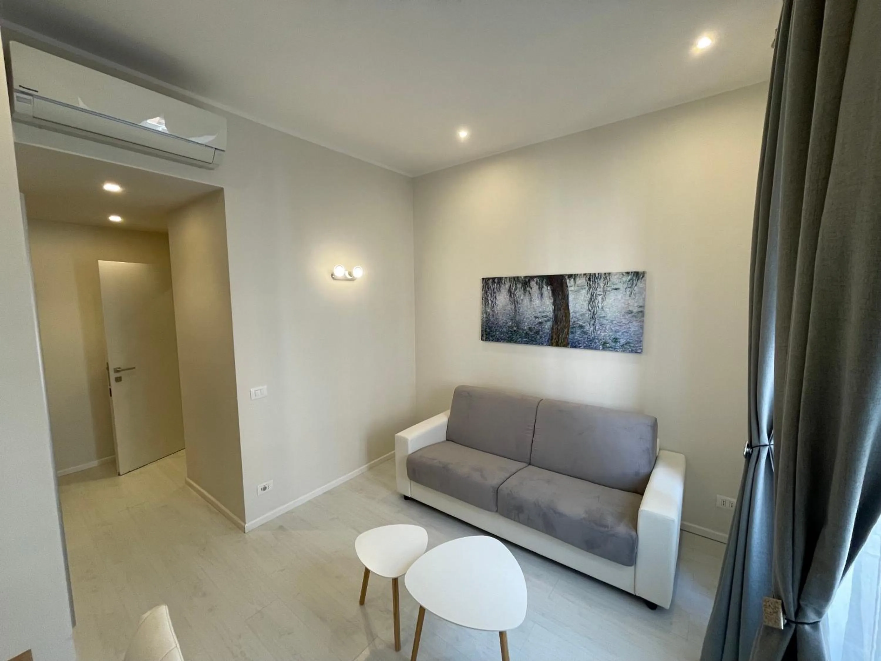 Seating area in Quintus Luxury Suites