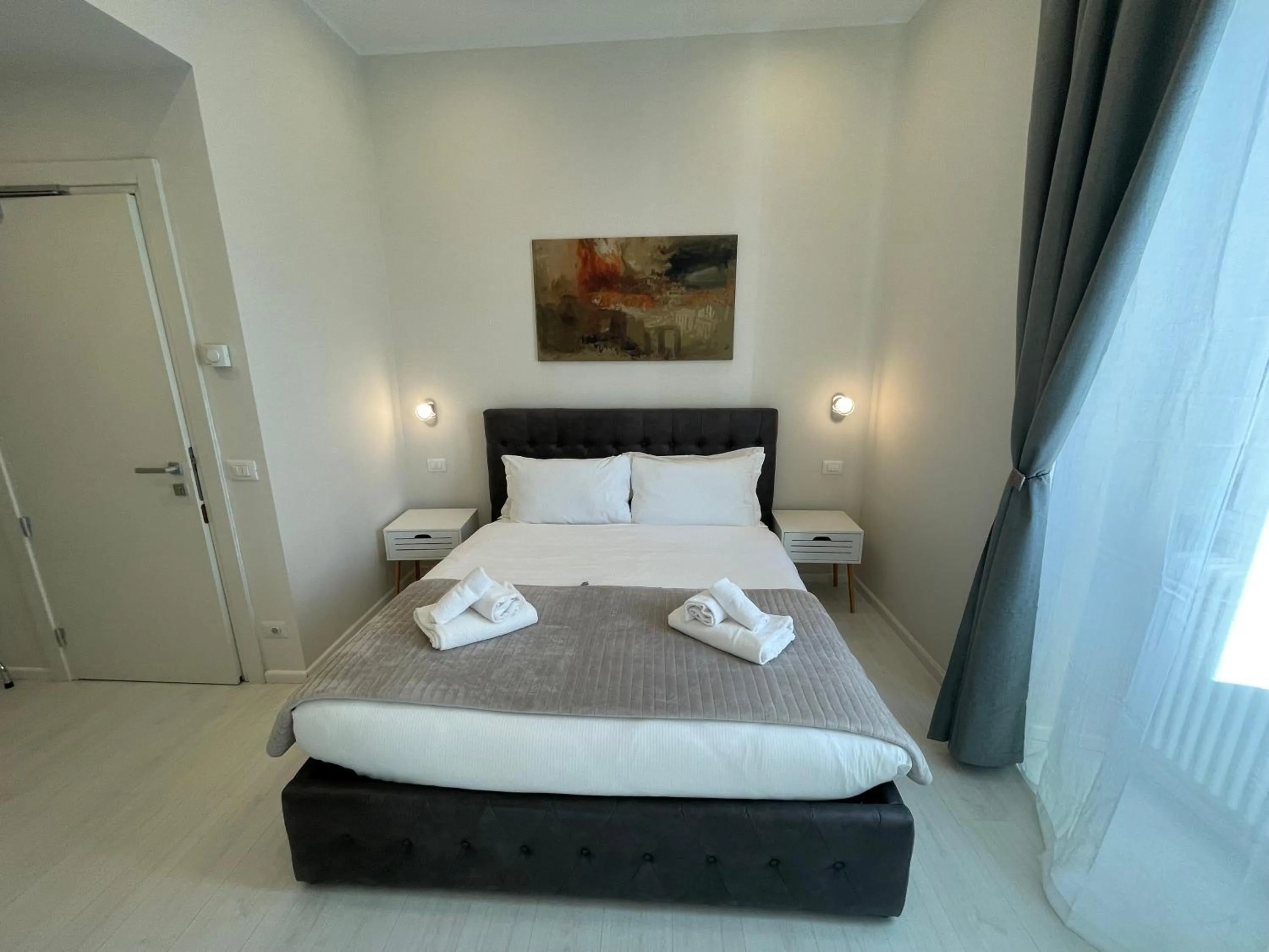 Bed in Quintus Luxury Suites