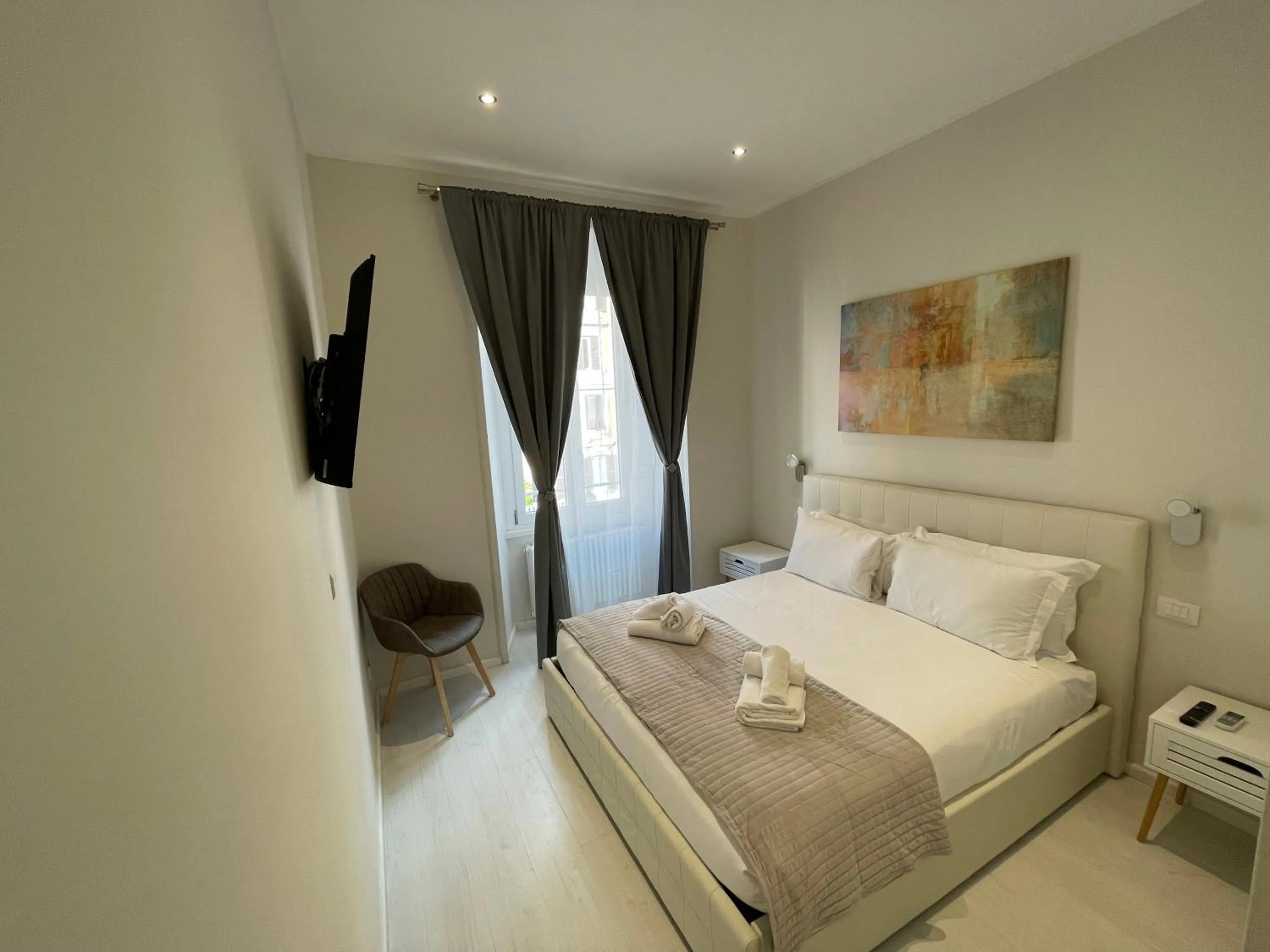 Bed in Quintus Luxury Suites