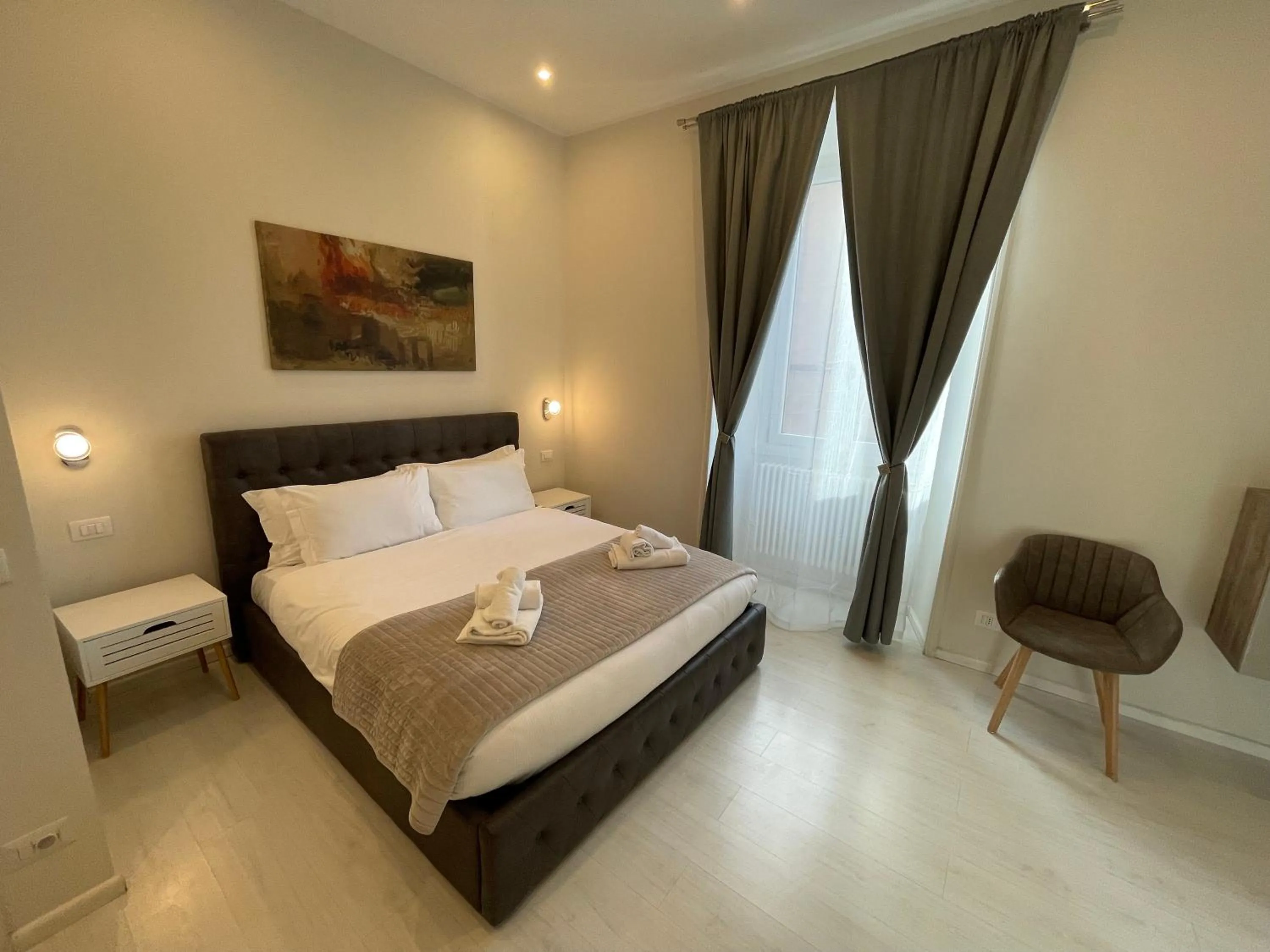Bed in Quintus Luxury Suites