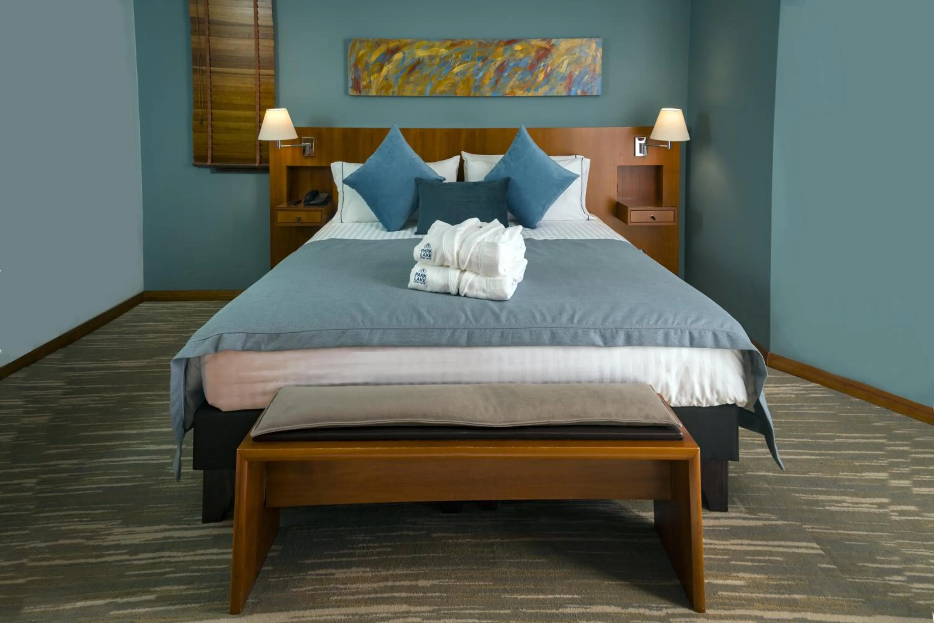 Bed in Park Lake Luxury Hotel