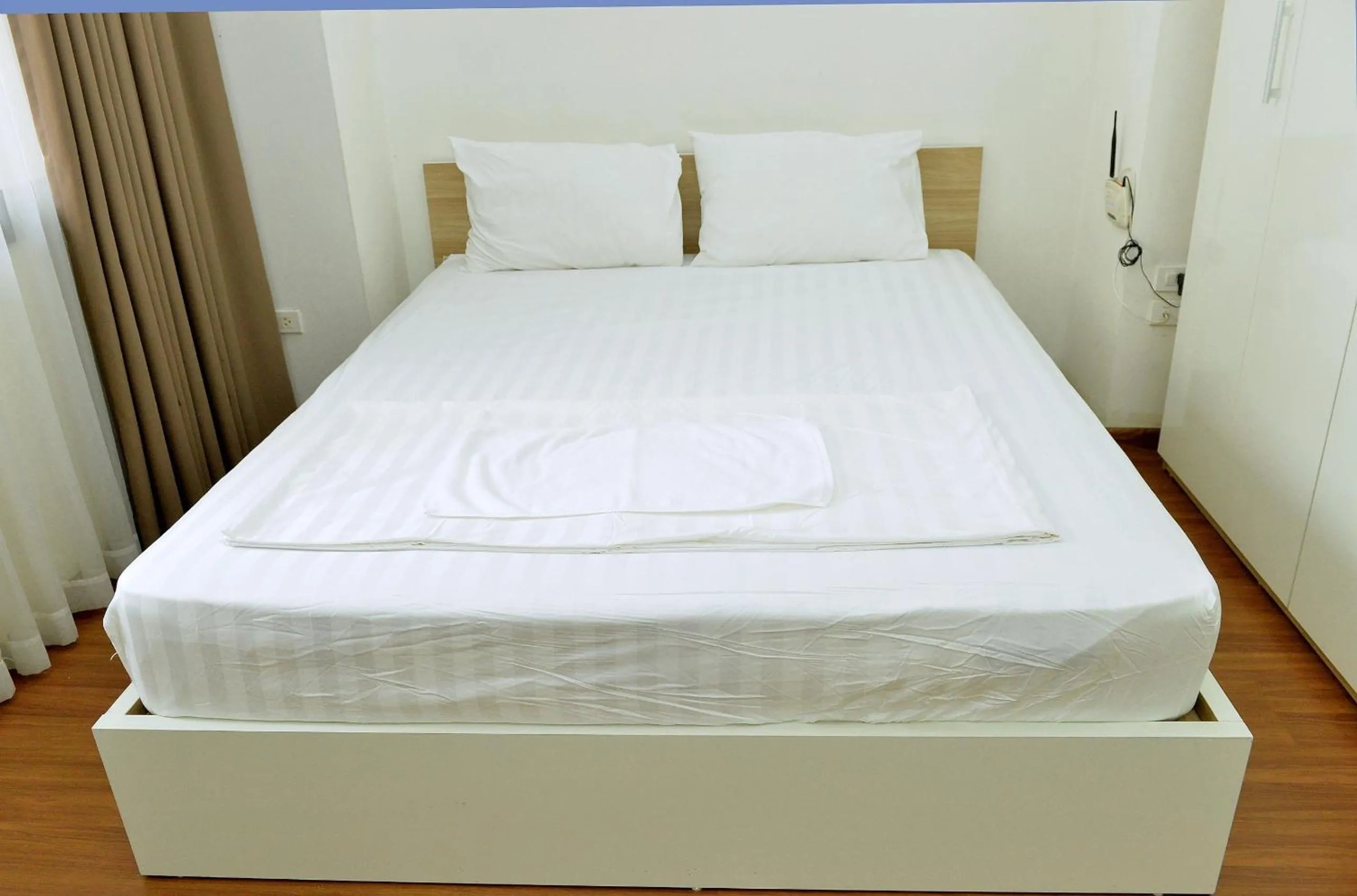 Bed in Era Apartment Đông Các