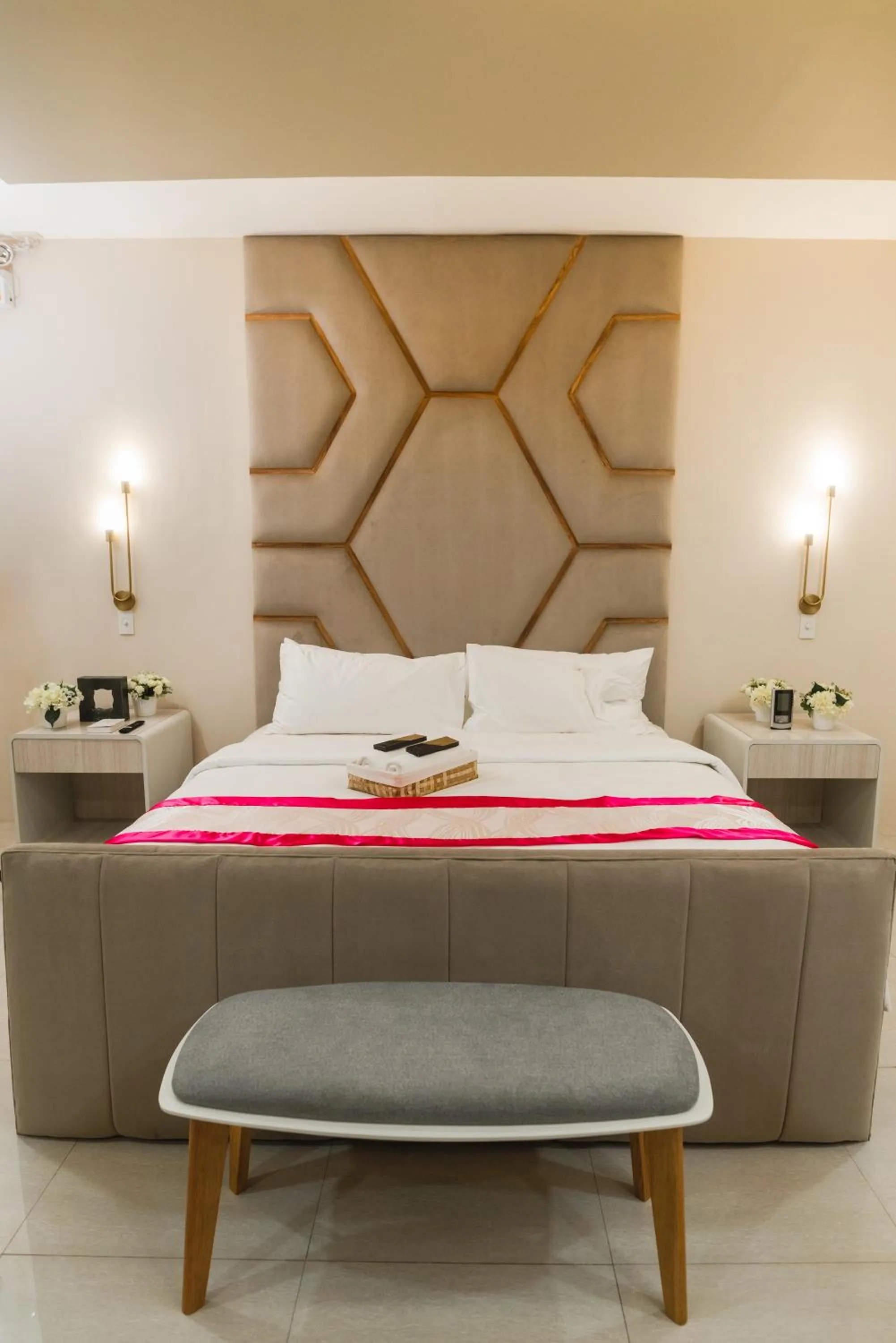 Bed in Monica Midtown Suites