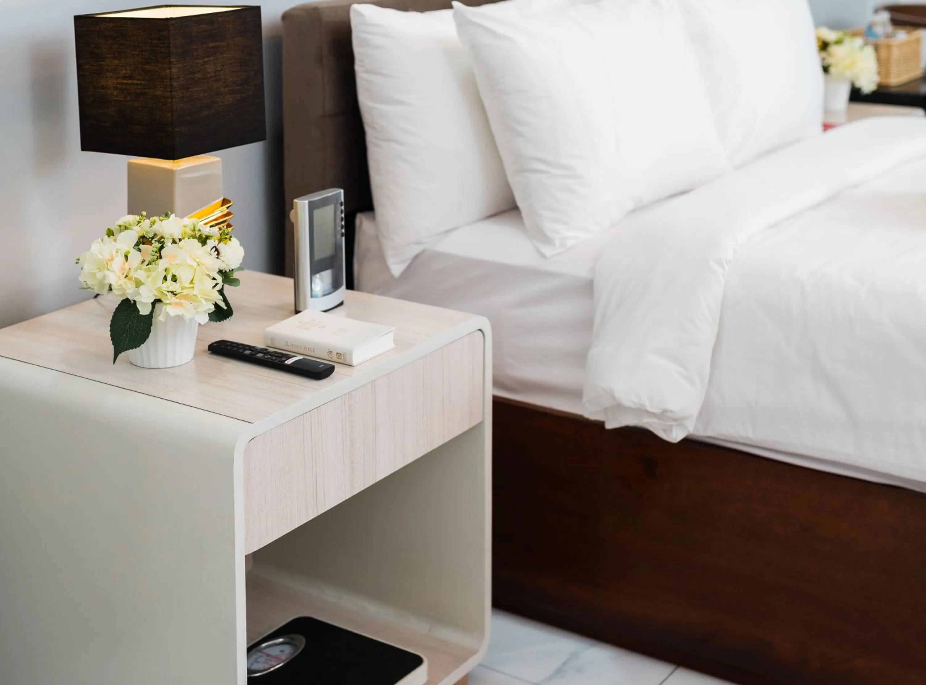 Bed in Monica Midtown Suites