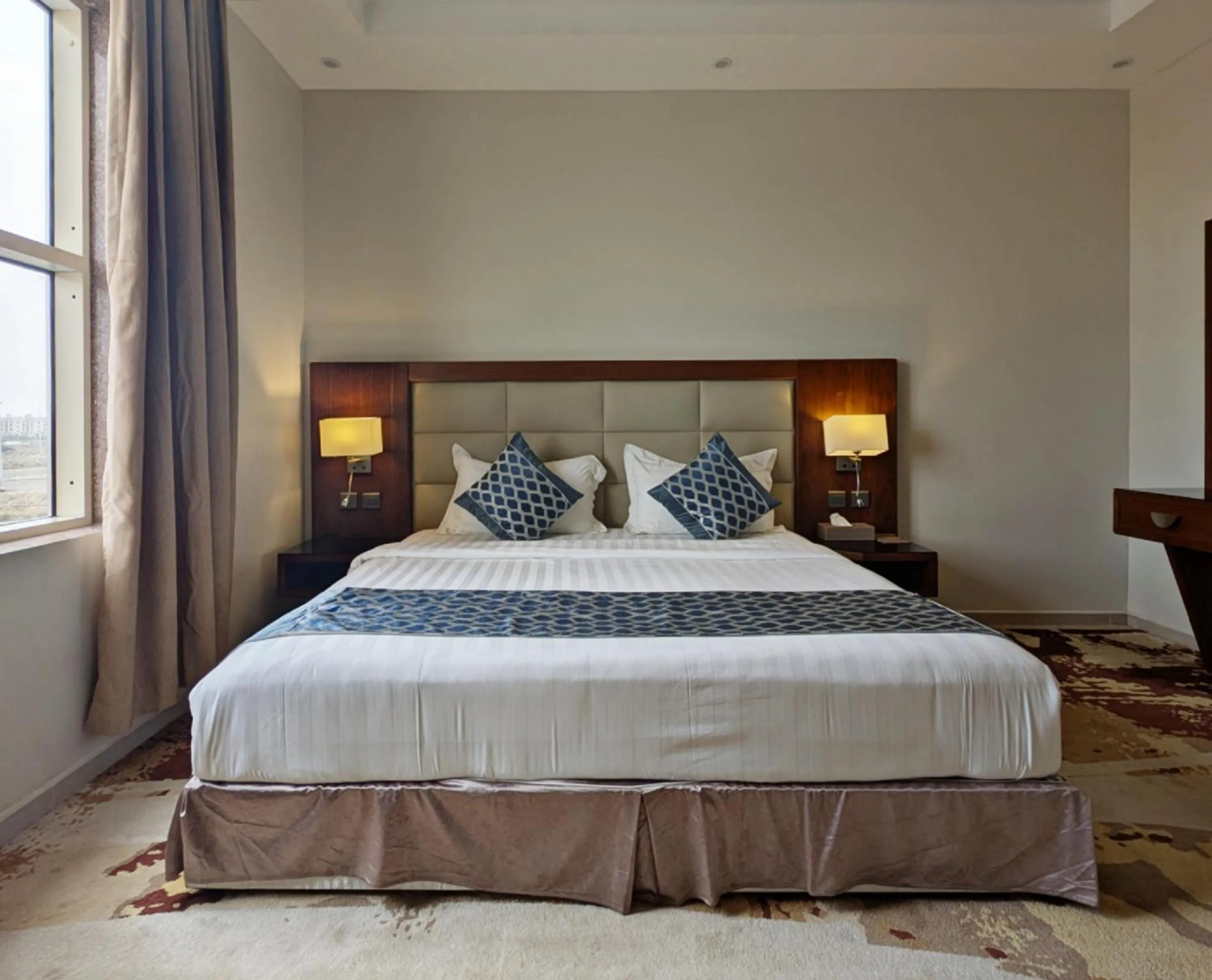 Bed in Delta Hotel Suites