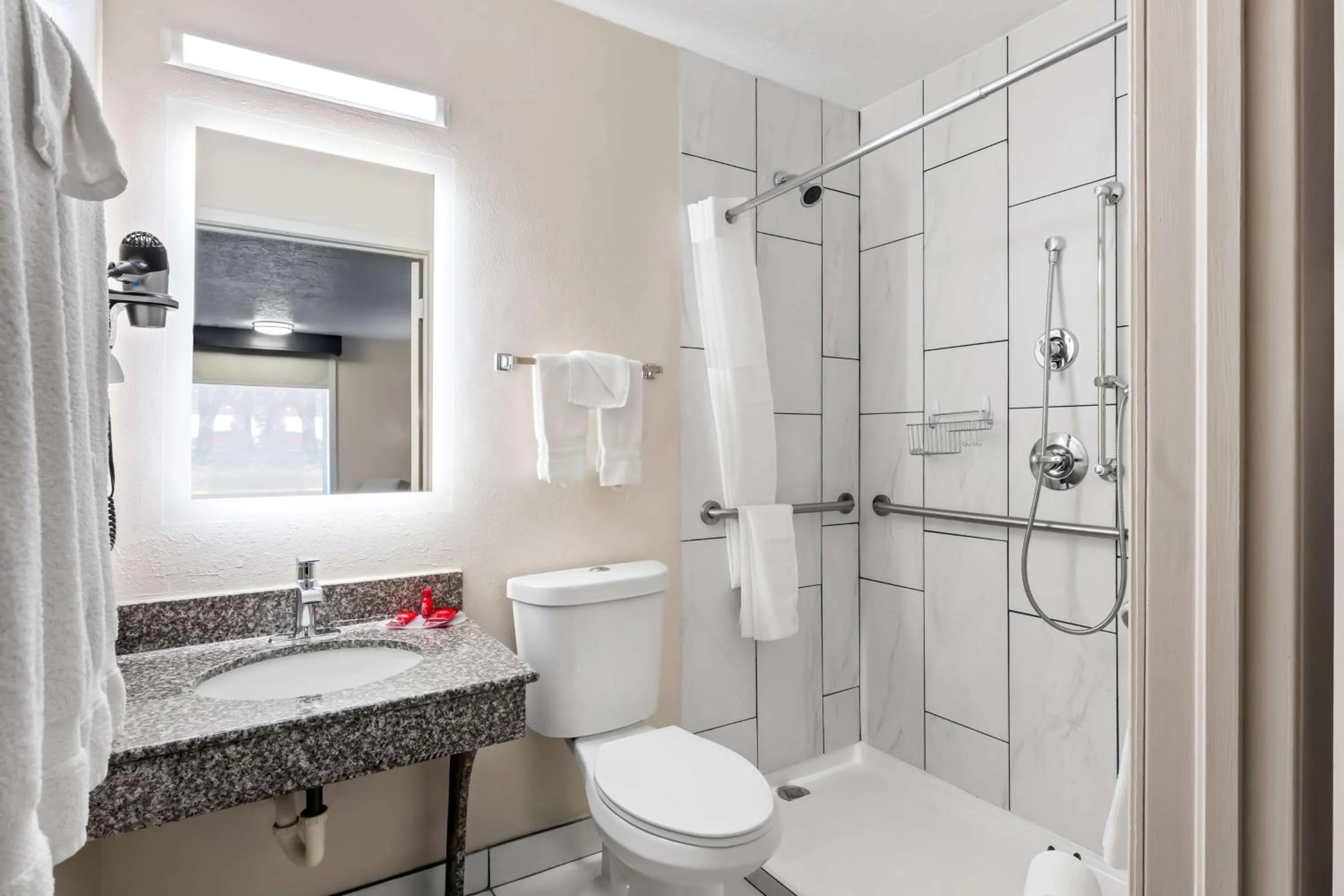 Bathroom in SureStay Hotel by Best Western Duncan