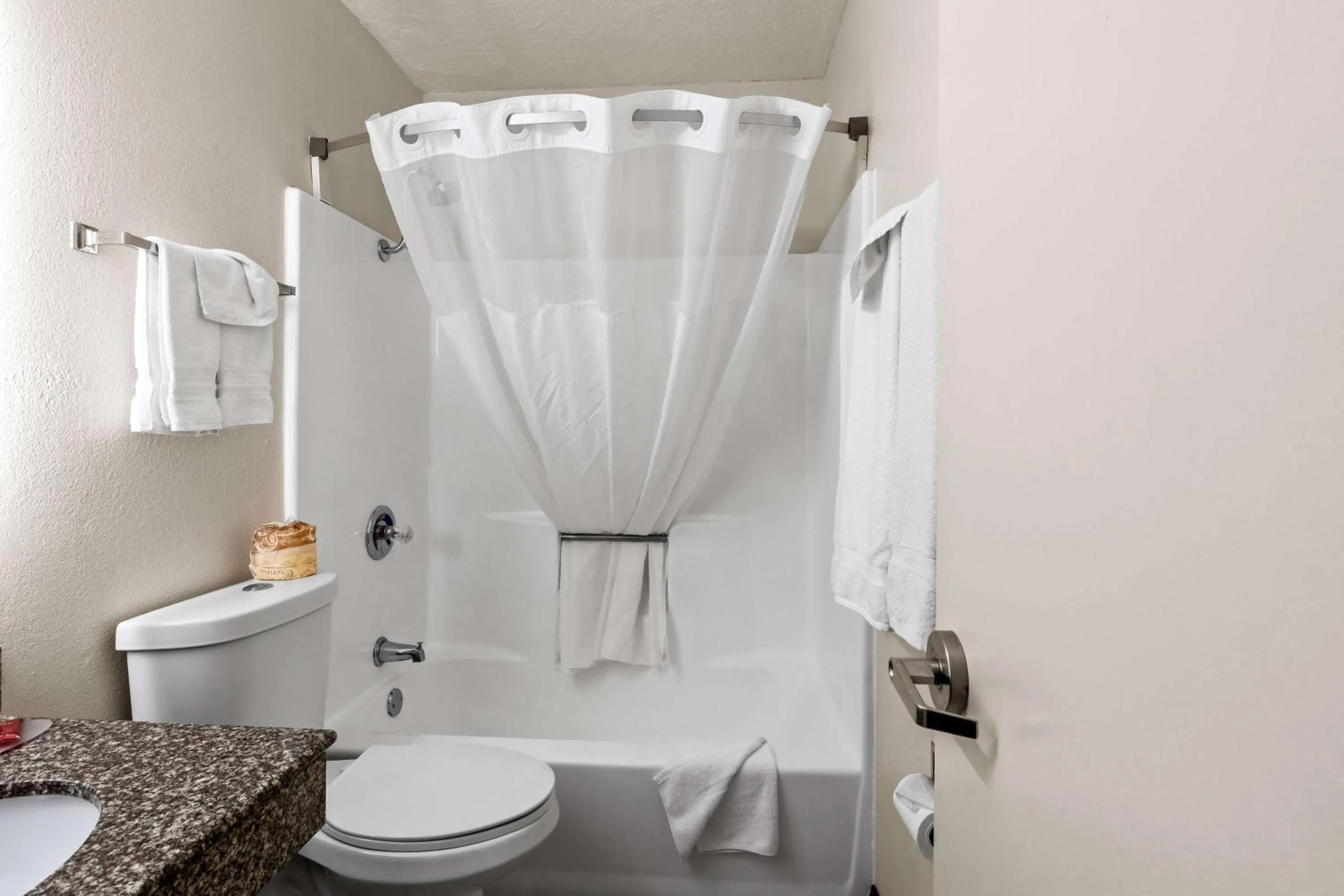 Bathroom in SureStay Hotel by Best Western Duncan