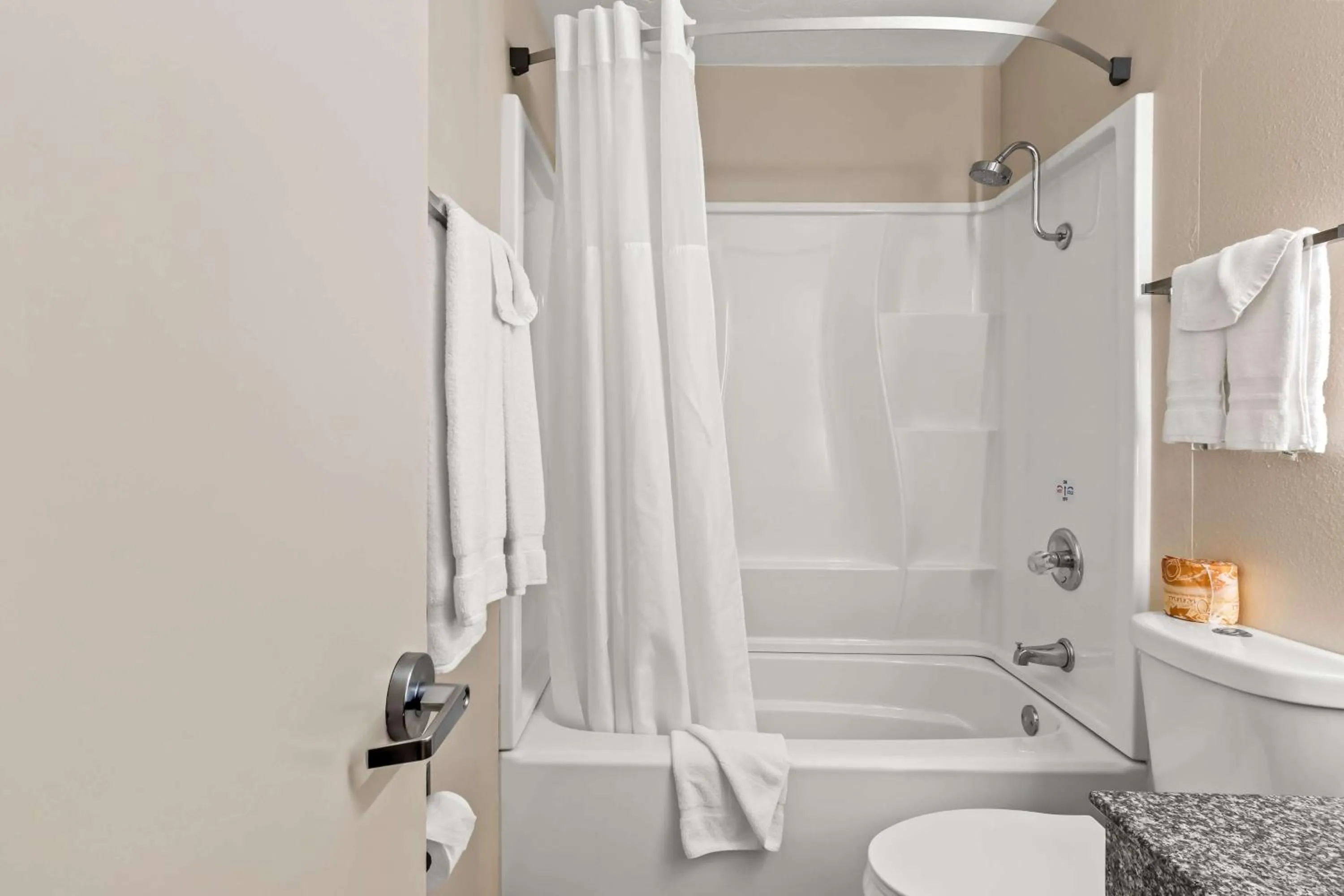 Bathroom in SureStay Hotel by Best Western Duncan