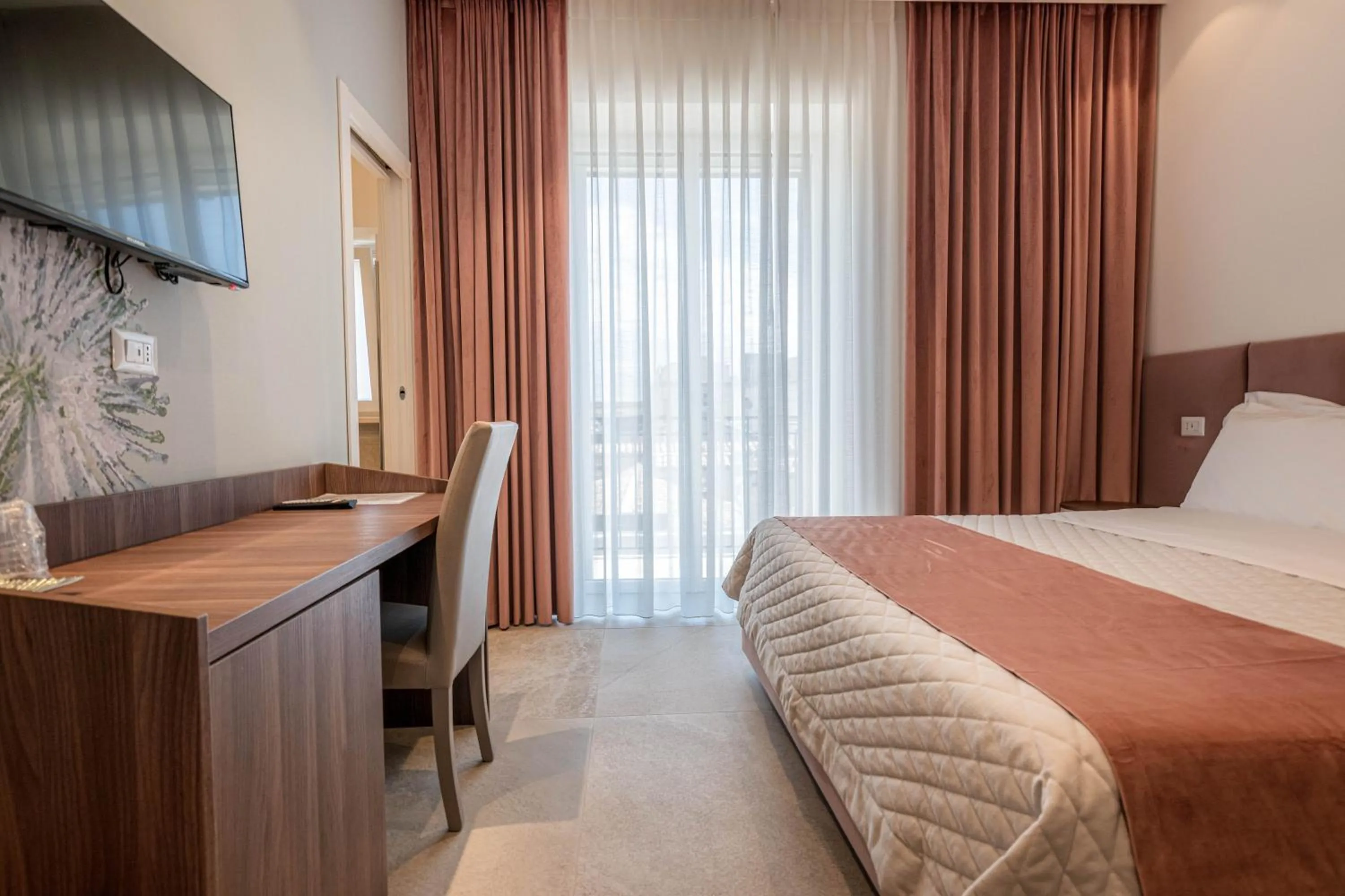 TV and multimedia, Bed in Profumi di Primavera Luxury Rooms & Suite