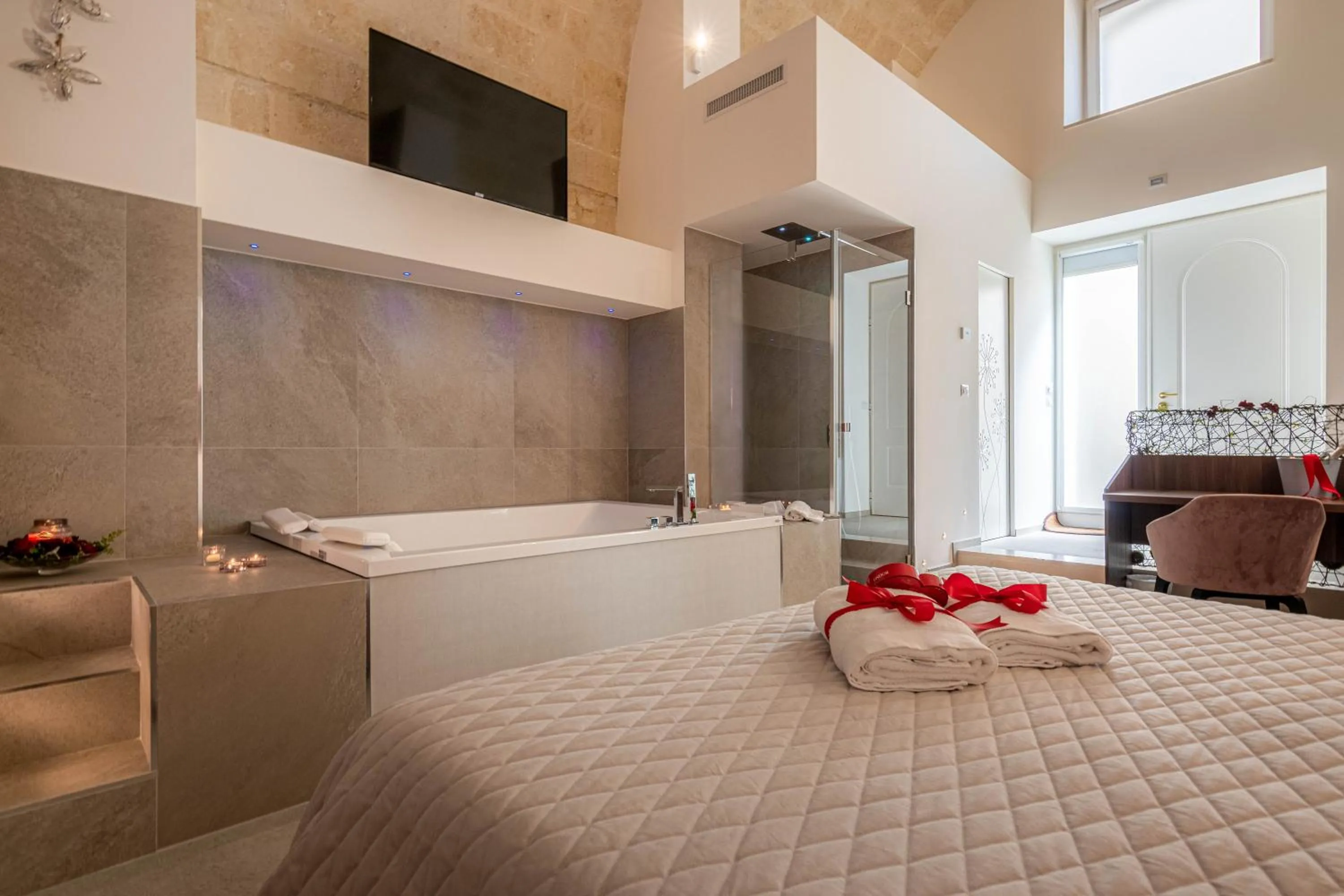 TV and multimedia, Bed in Profumi di Primavera Luxury Rooms & Suite