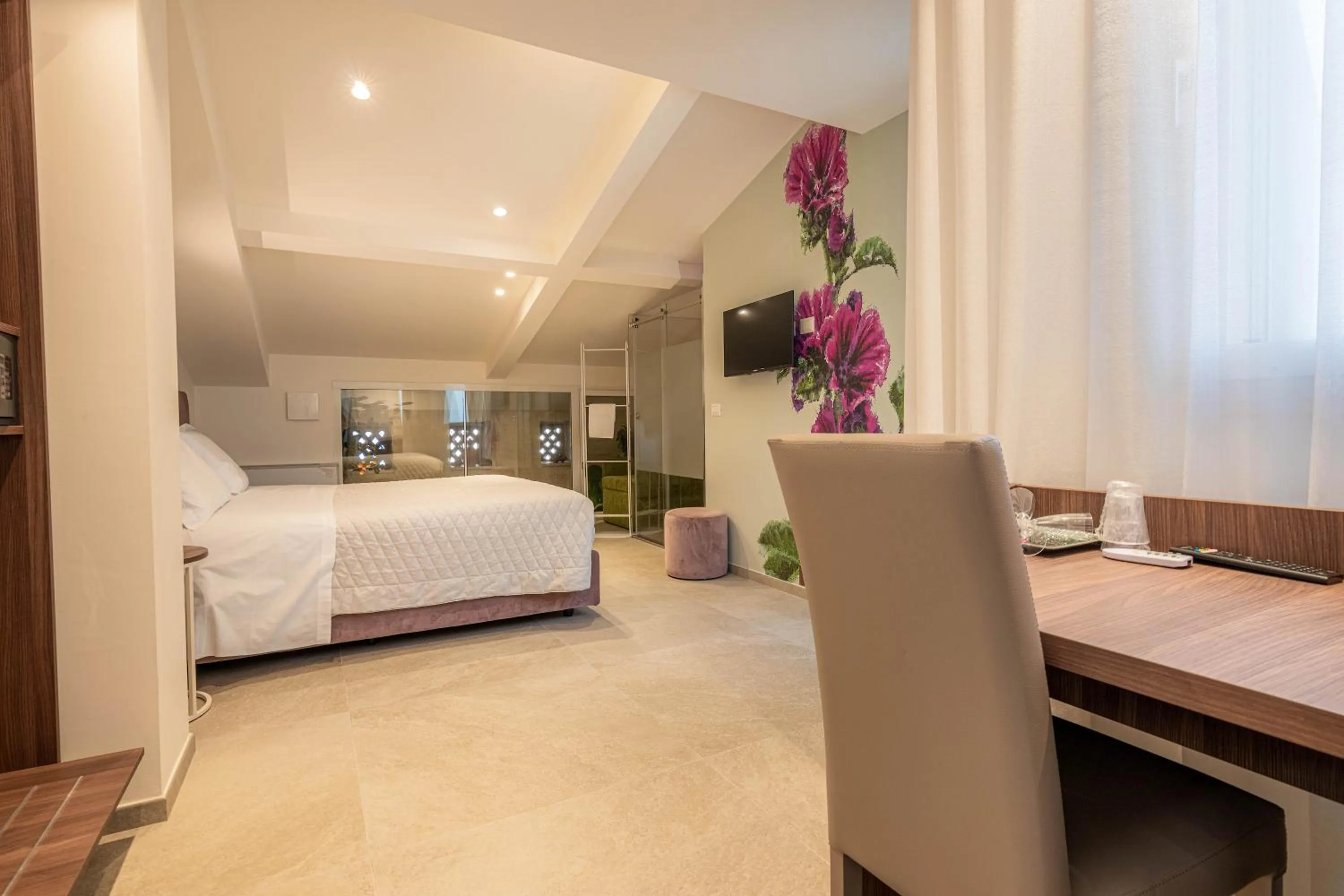 TV and multimedia, Bed in Profumi di Primavera Luxury Rooms & Suite