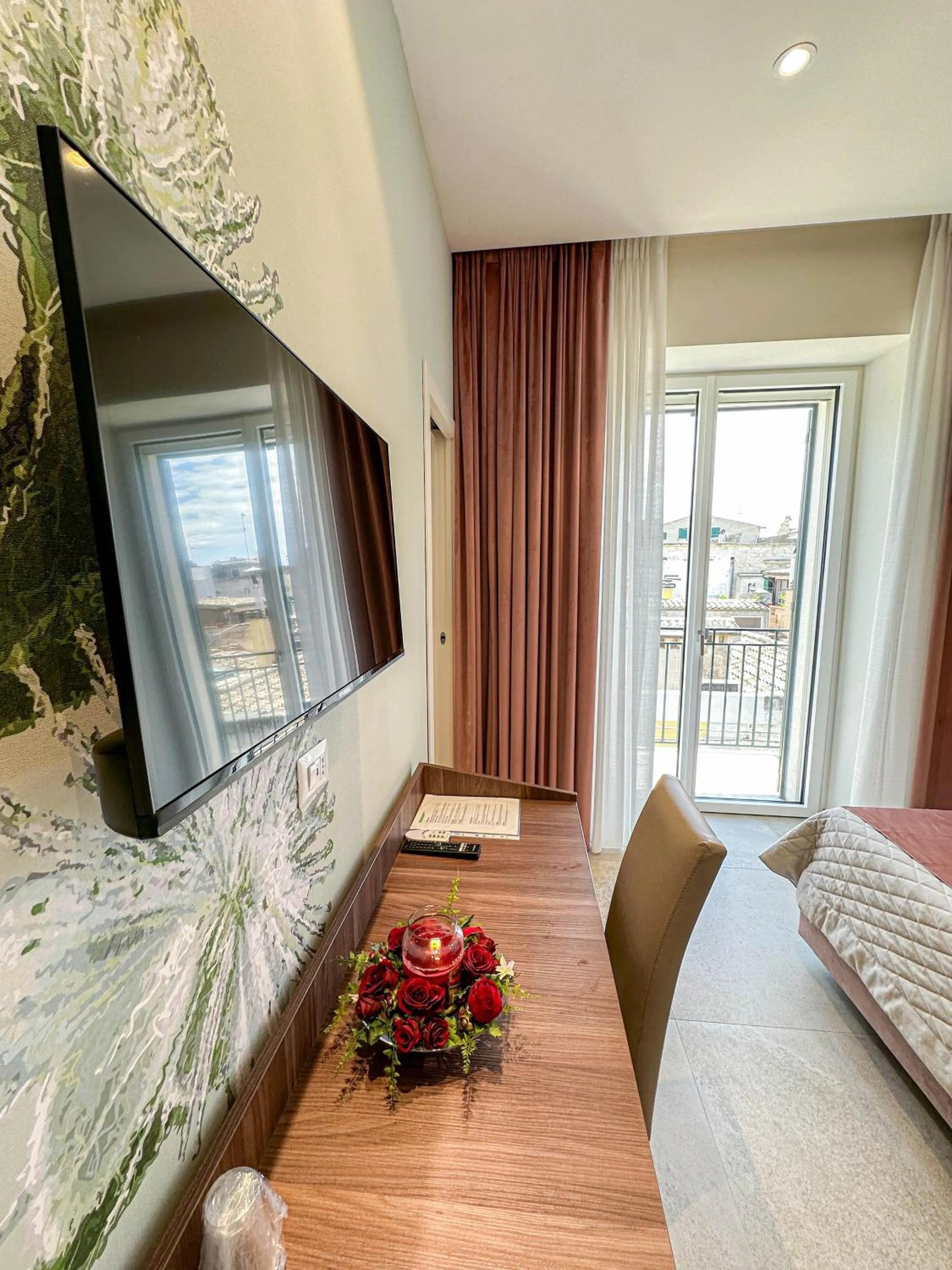 TV and multimedia, Bed in Profumi di Primavera Luxury Rooms & Suite