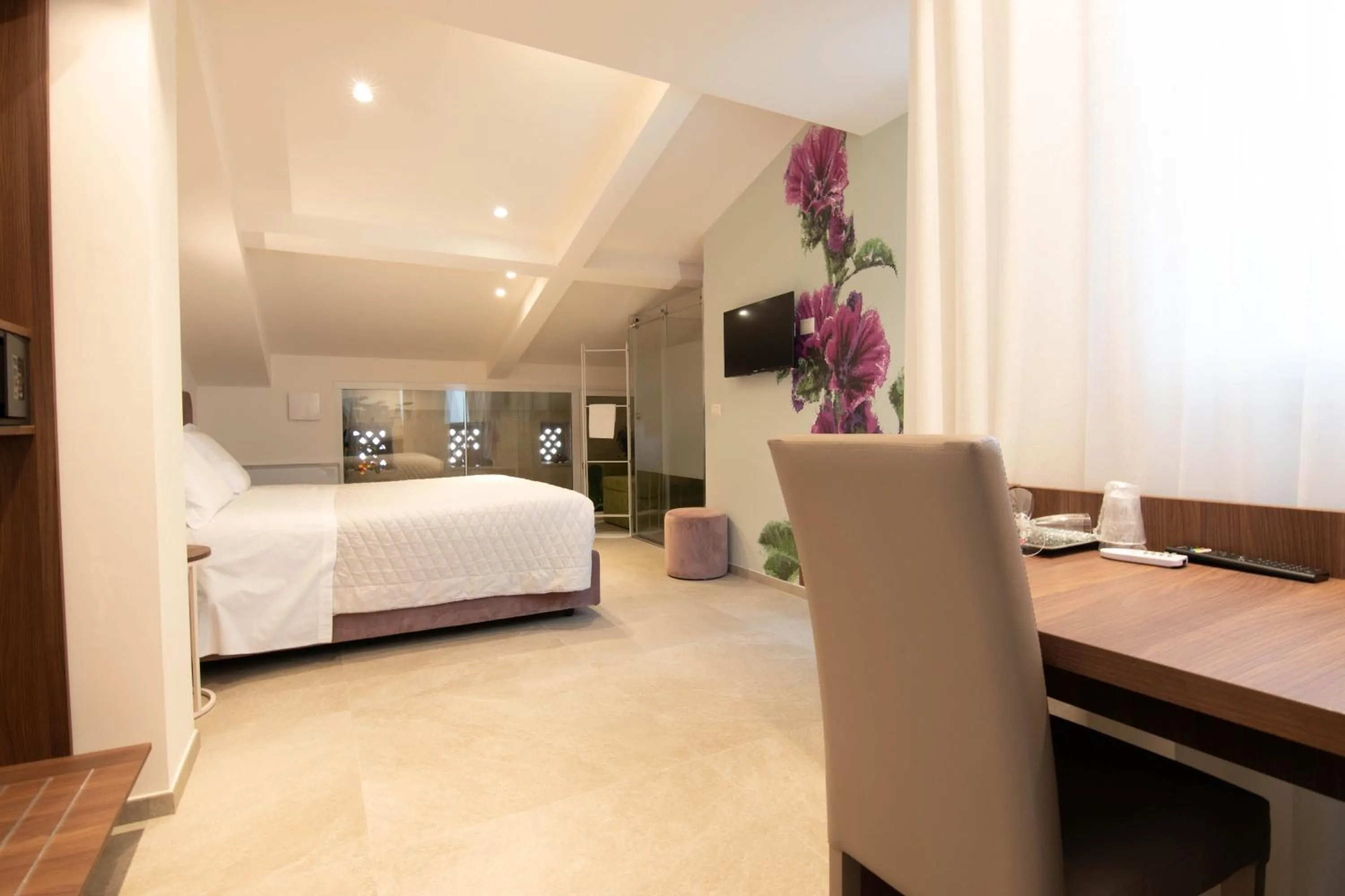 TV and multimedia, Bed in Profumi di Primavera Luxury Rooms & Suite