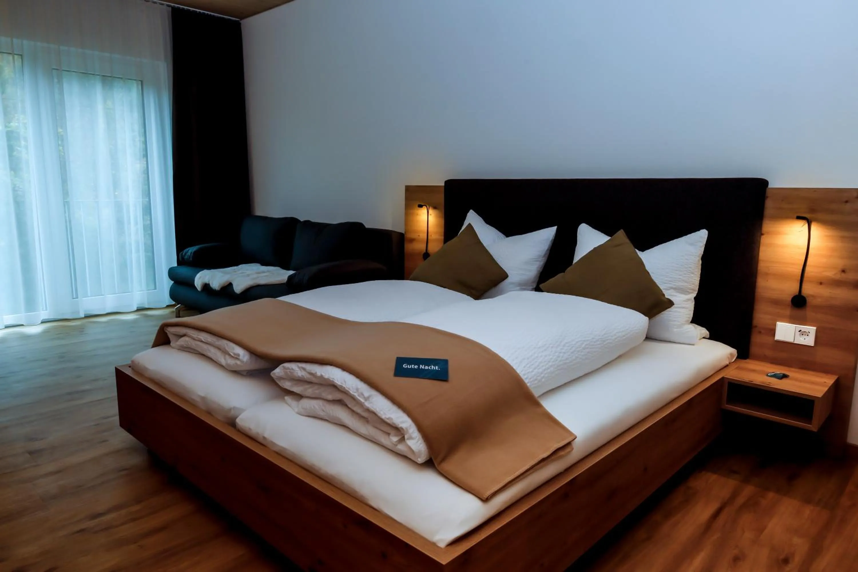 Bed in DAS GEORG Gästehaus in Epfendorf