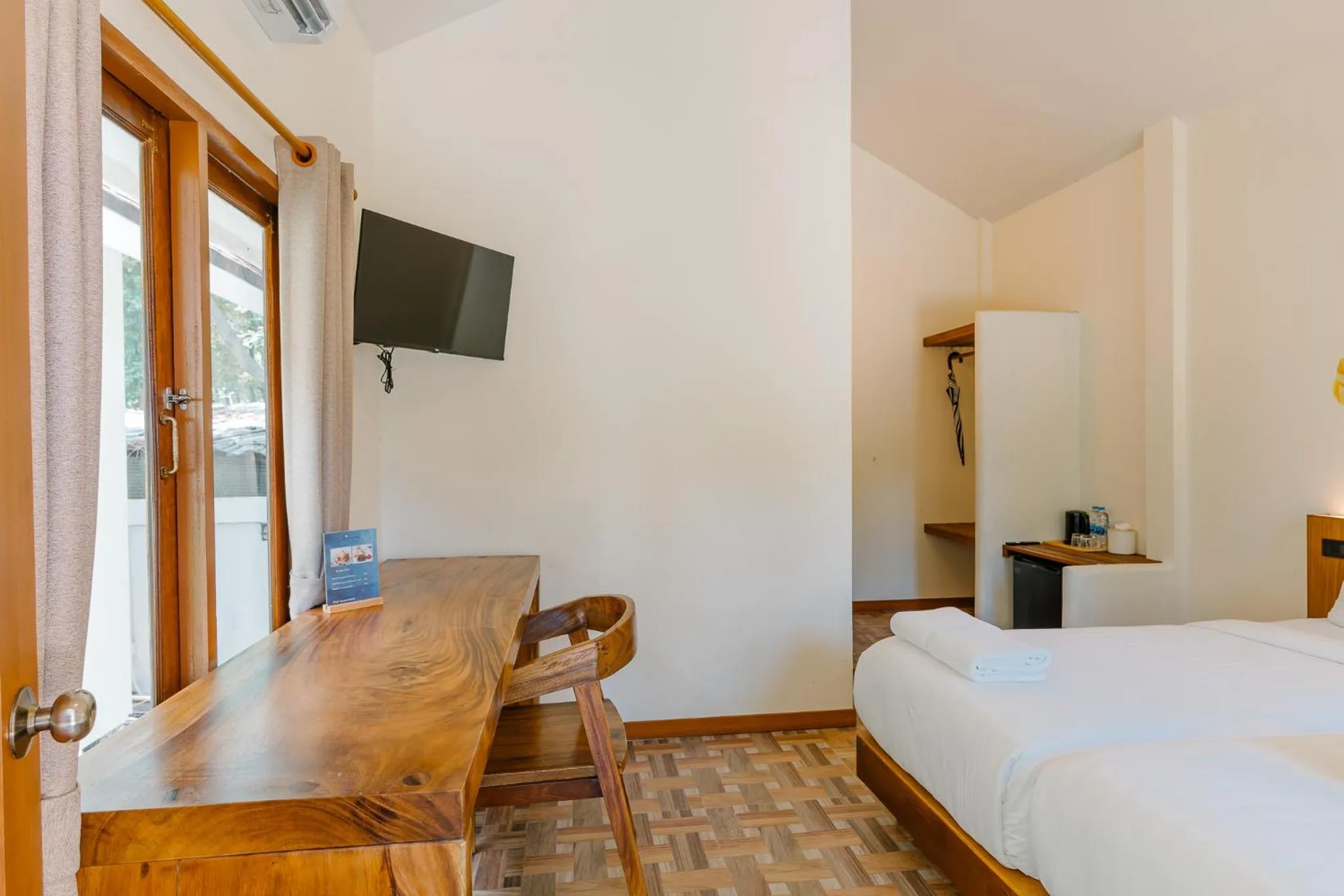 Seating area, Bed in Diamond Beach Resort