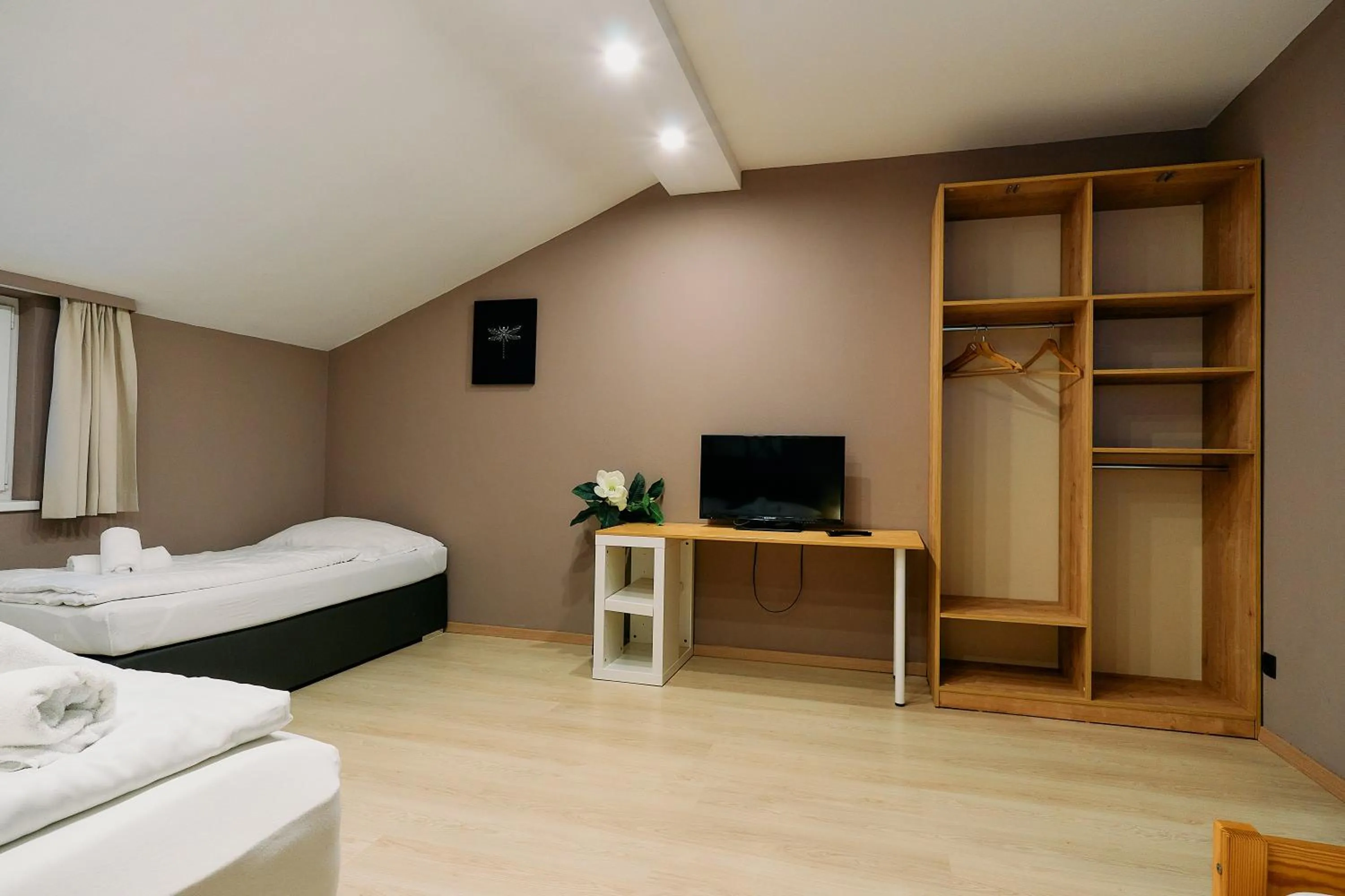 Bed in The Art and Sporthotel