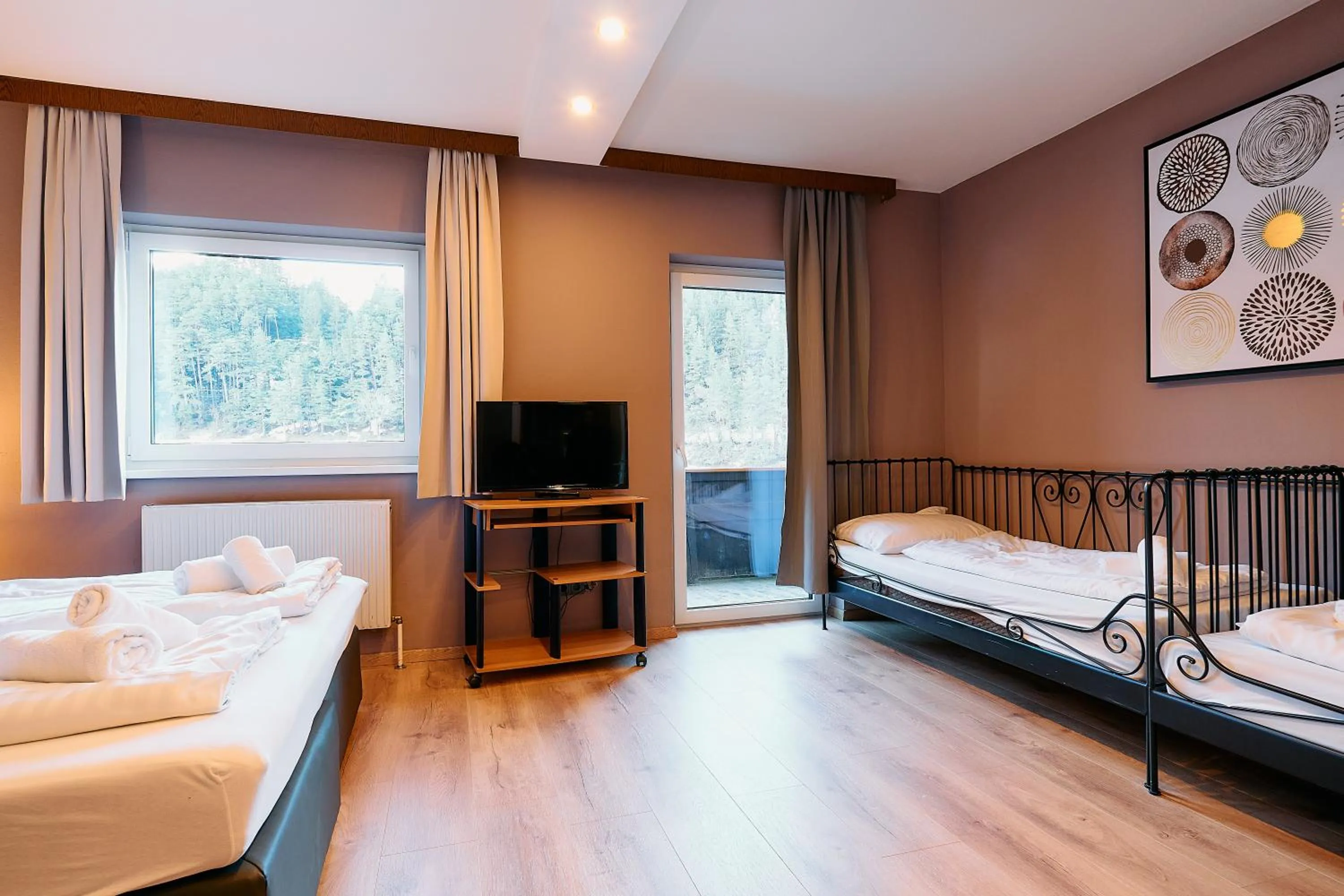 Bed in The Art and Sporthotel