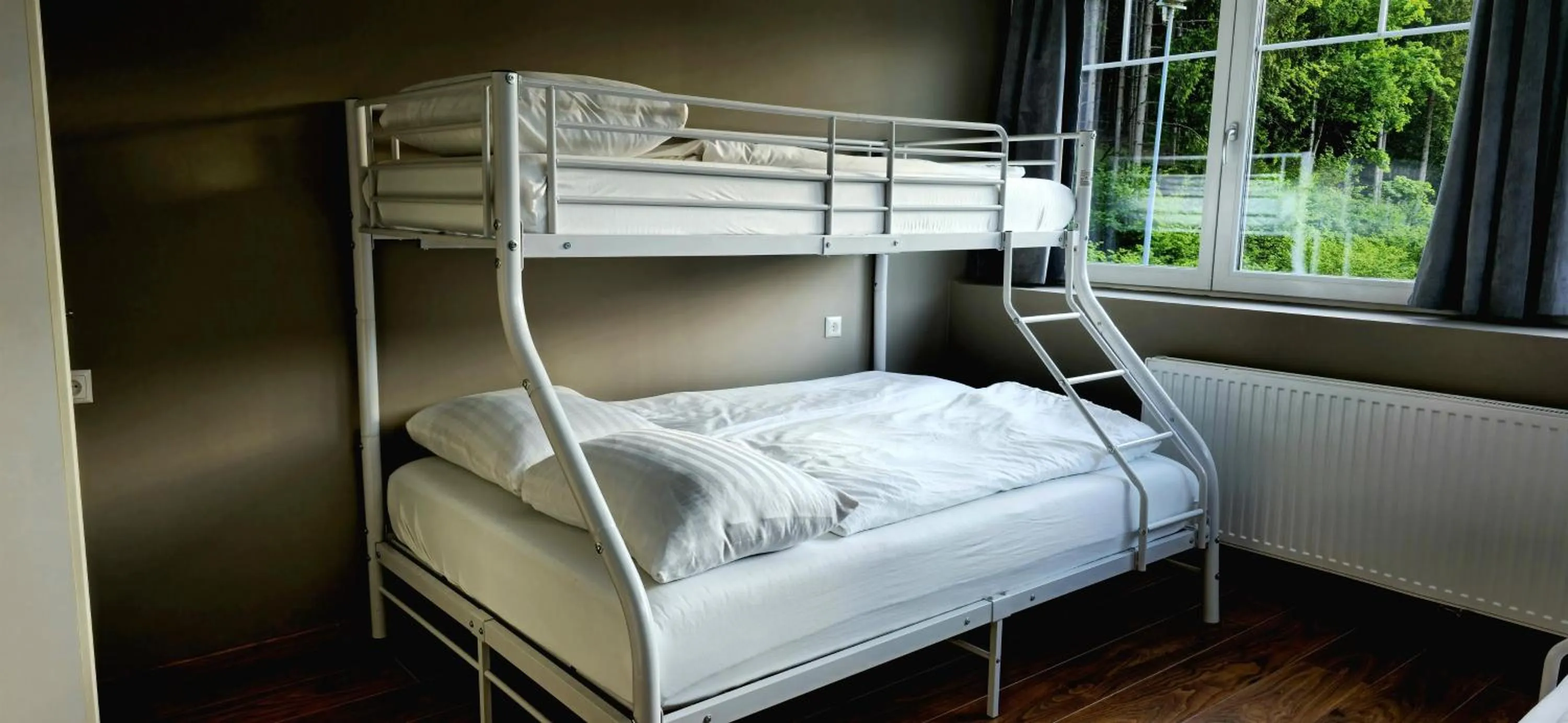 Bed in The Art and Sporthotel