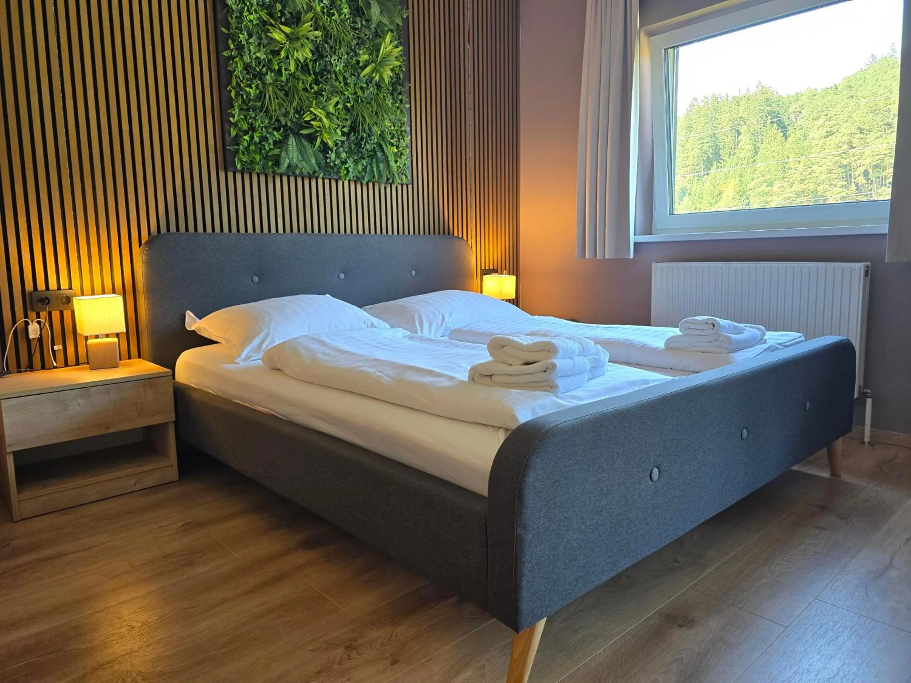 Bed in The Art and Sporthotel