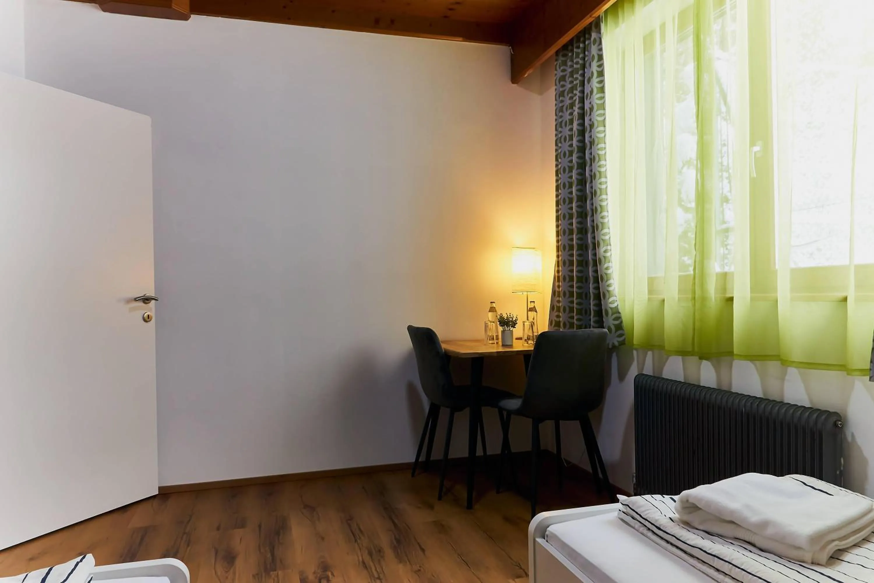 Seating area, Bed in The Art and Sporthotel