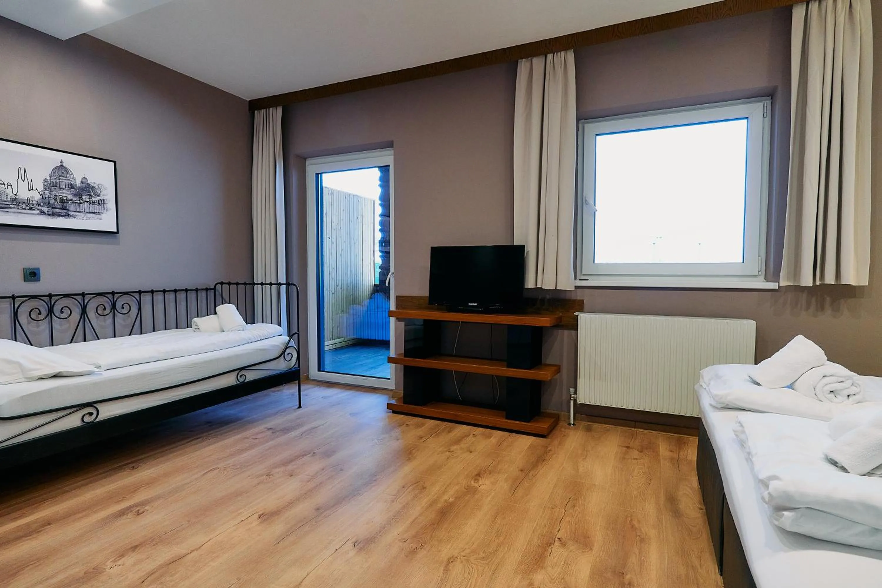 Bed in The Art and Sporthotel