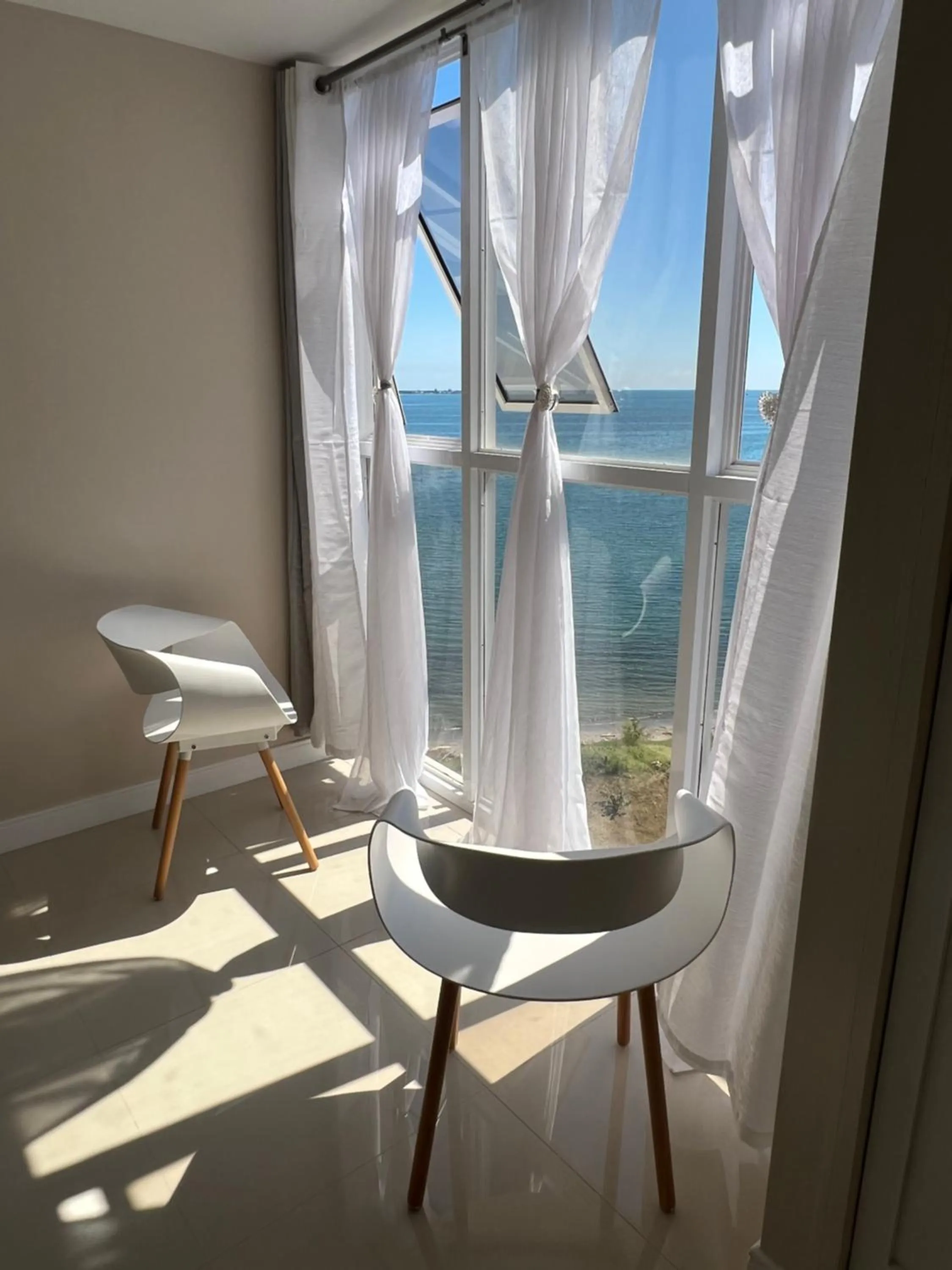 Seating area in Large Luxurious Beach Front at Bayfront Villa