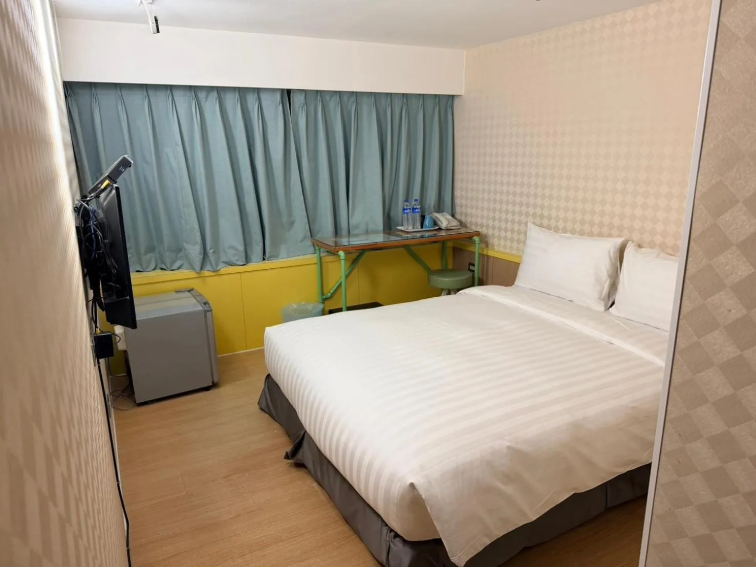 Bed in Ximenhotel-Xining西門大飯店-西寧館