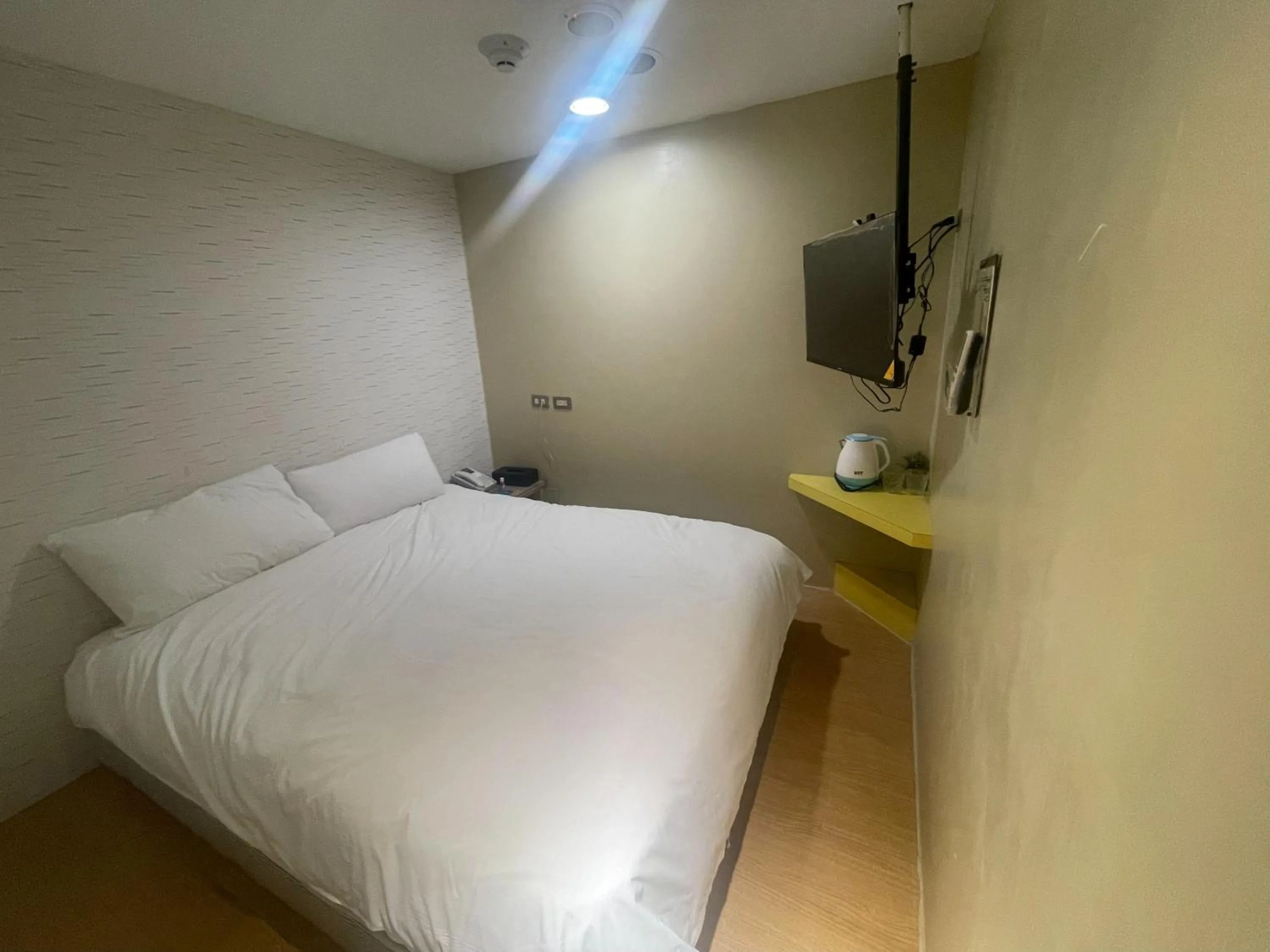 Bed in Ximenhotel-Xining西門大飯店-西寧館
