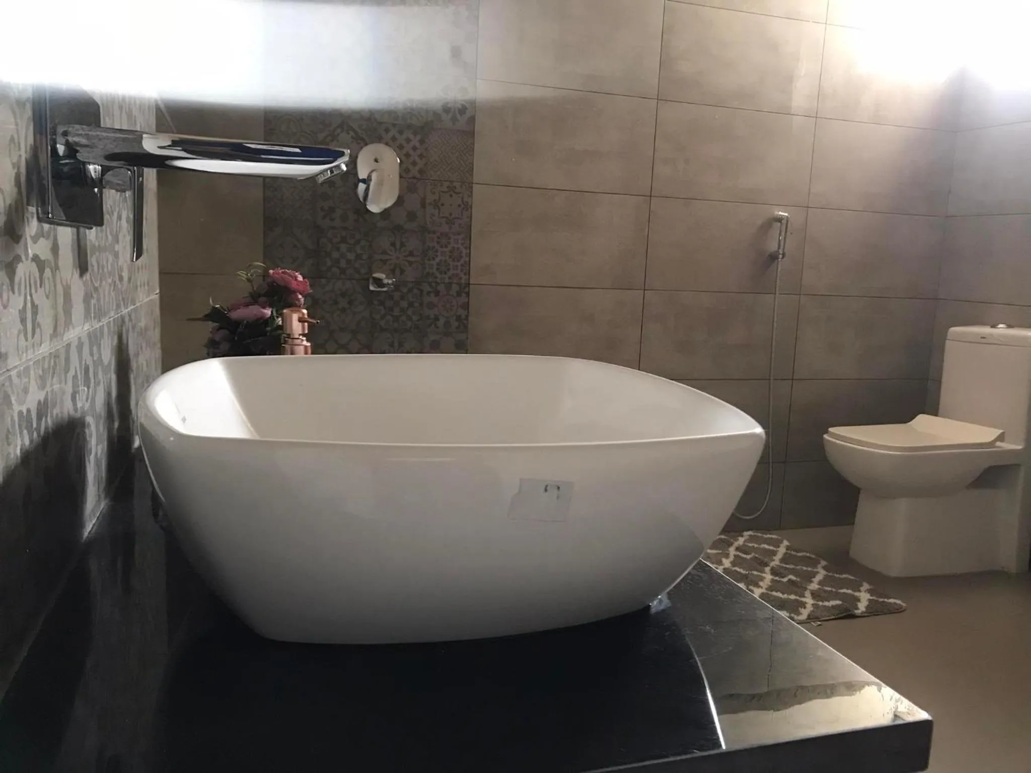 Bathroom in Mariya Condo hotel