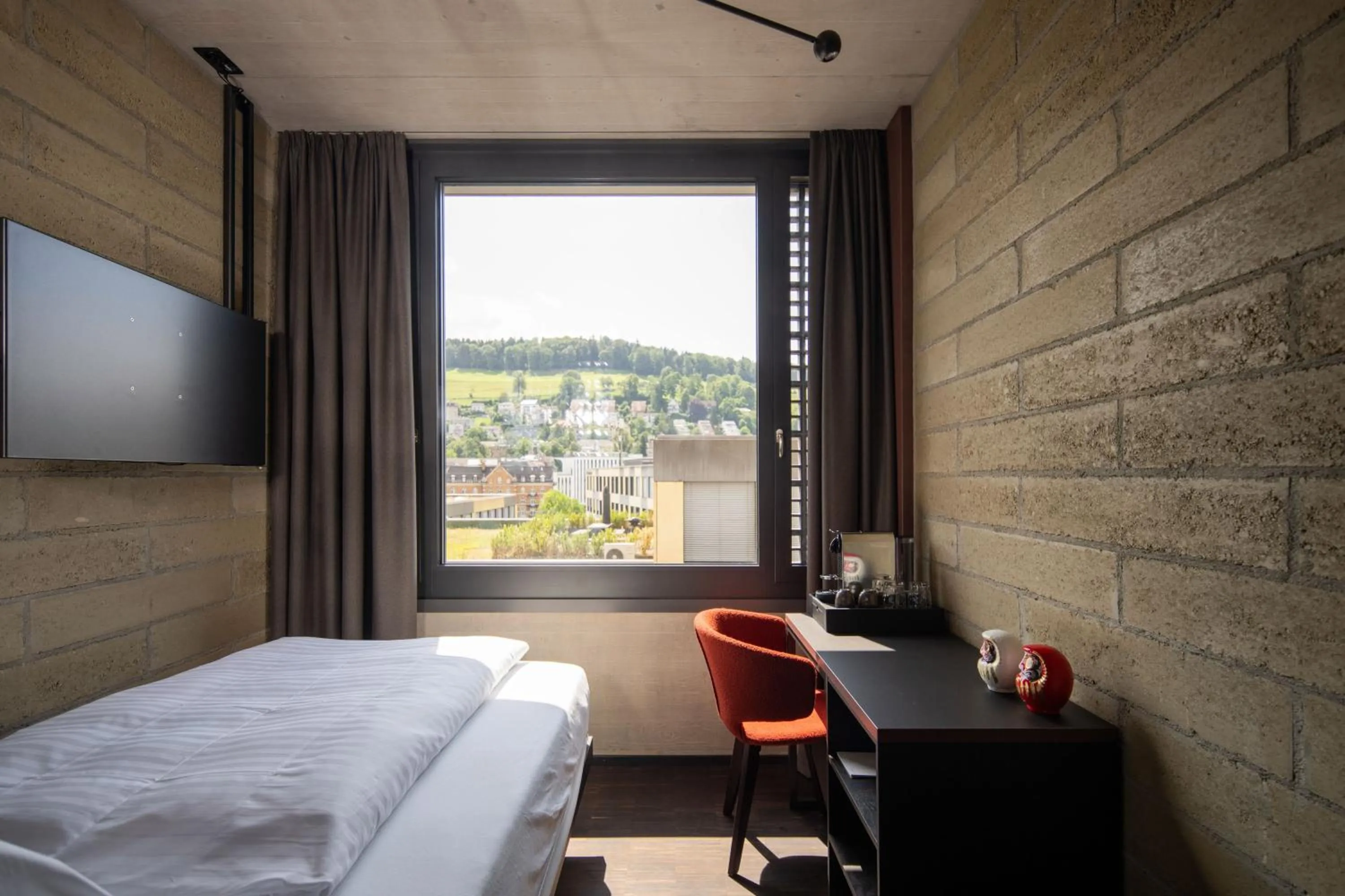 View (from property/room), Bed in Tailormade Hotel LEO St Gallen