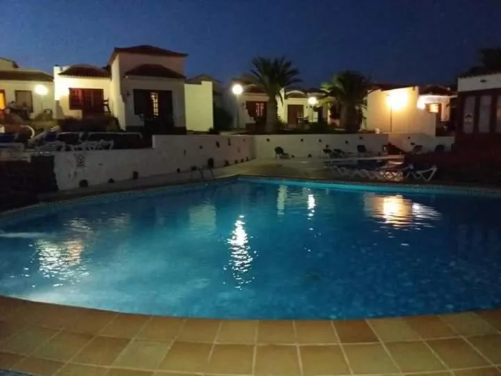 Pool view in Bungalows Castillo Beach