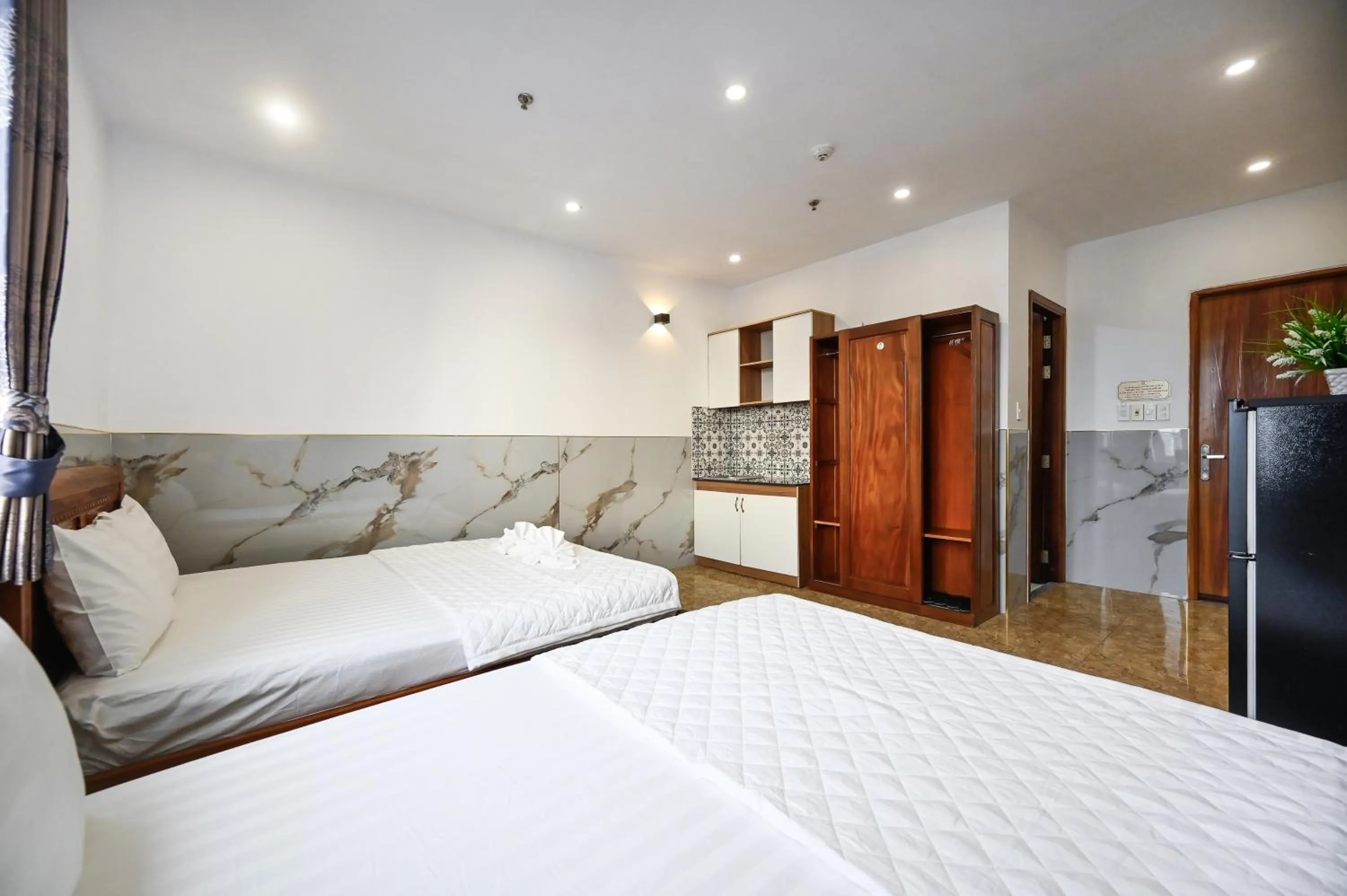 Bed in Yoyo Airport Saigon Hotel