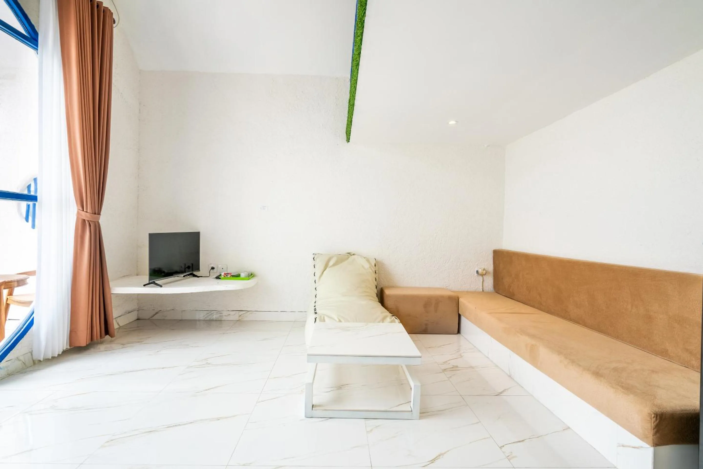 Living room in Anny Guesthouse by ecommerceloka