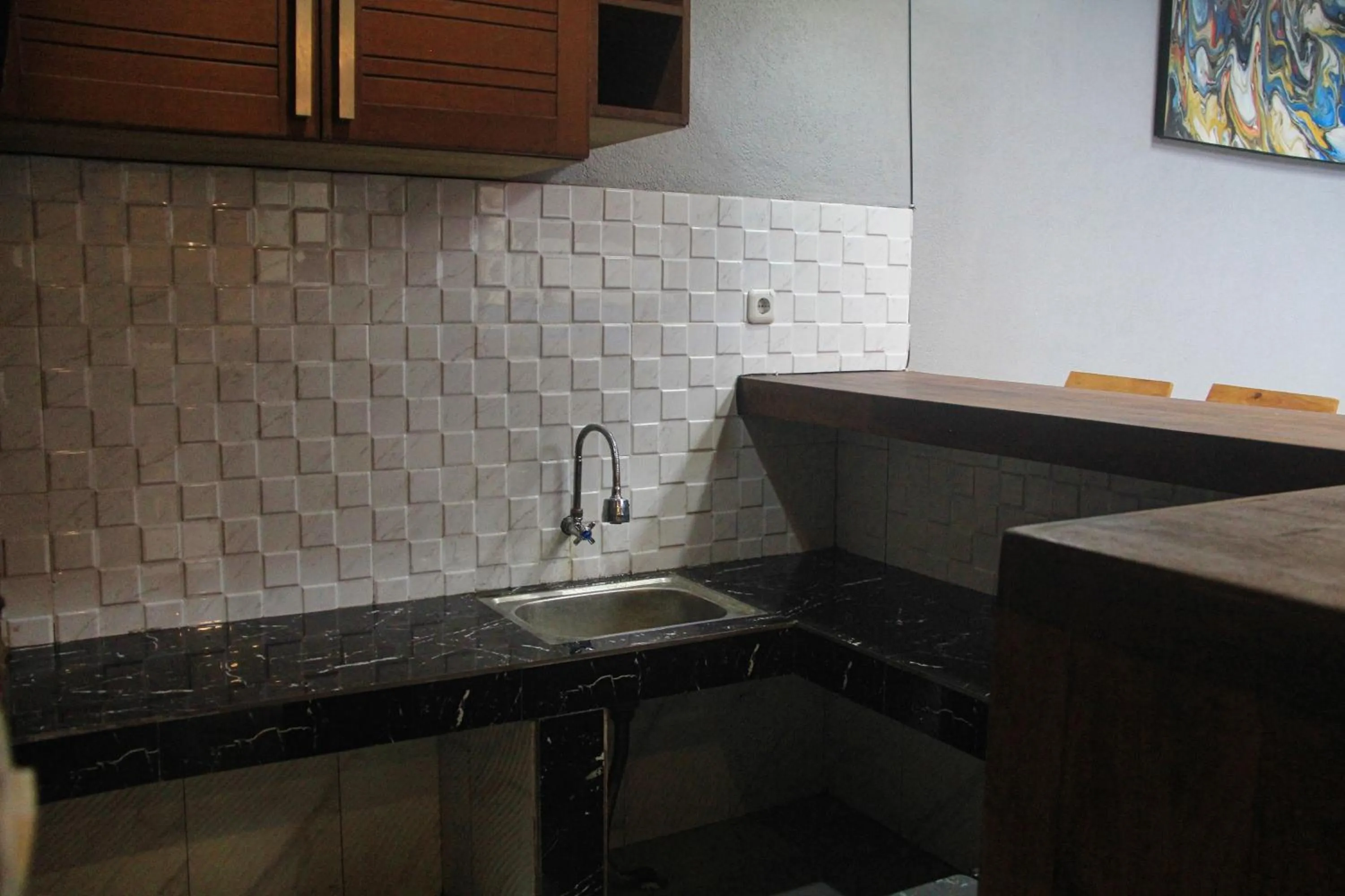 kitchen in Anny Guesthouse by ecommerceloka