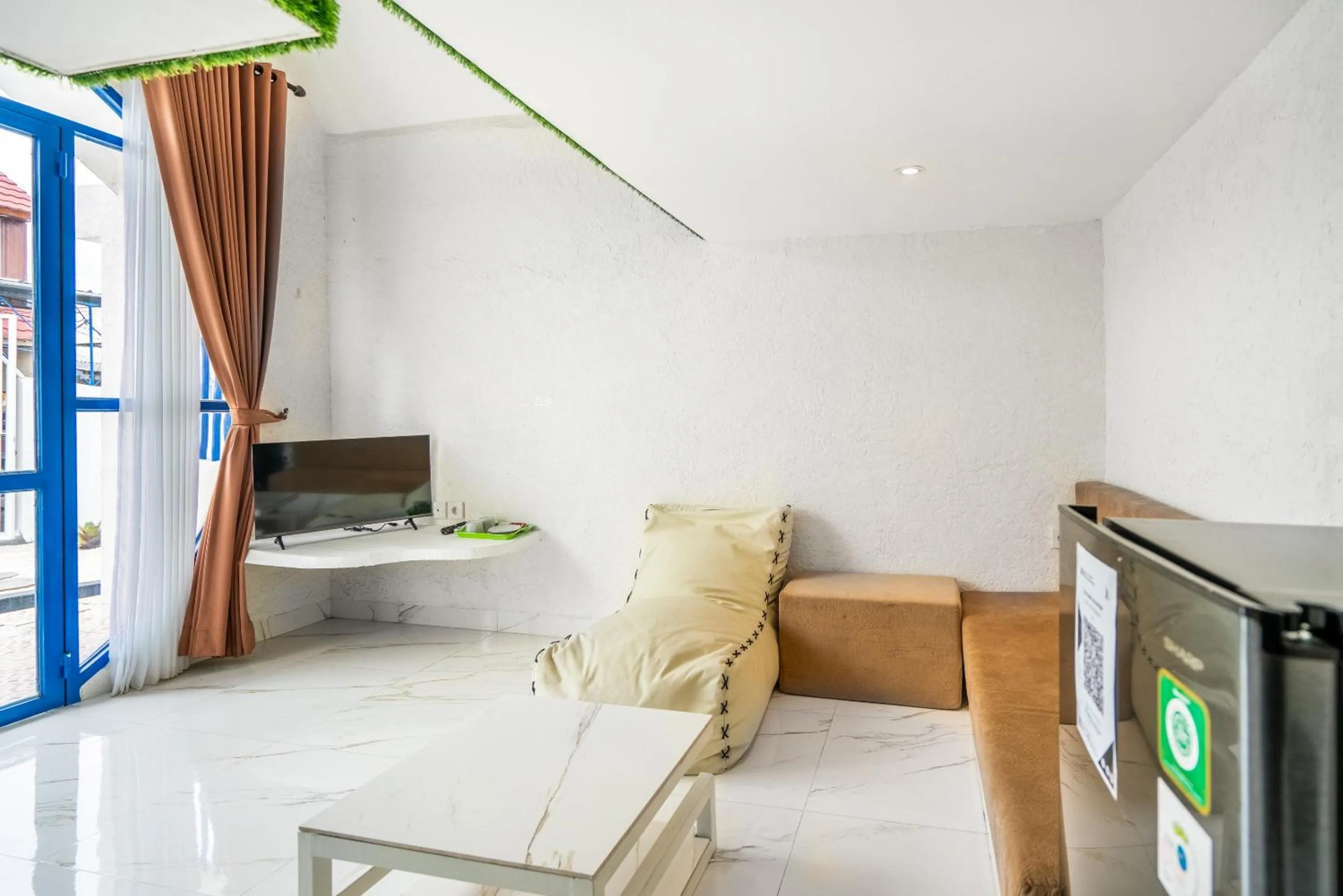 Living room in Anny Guesthouse by ecommerceloka