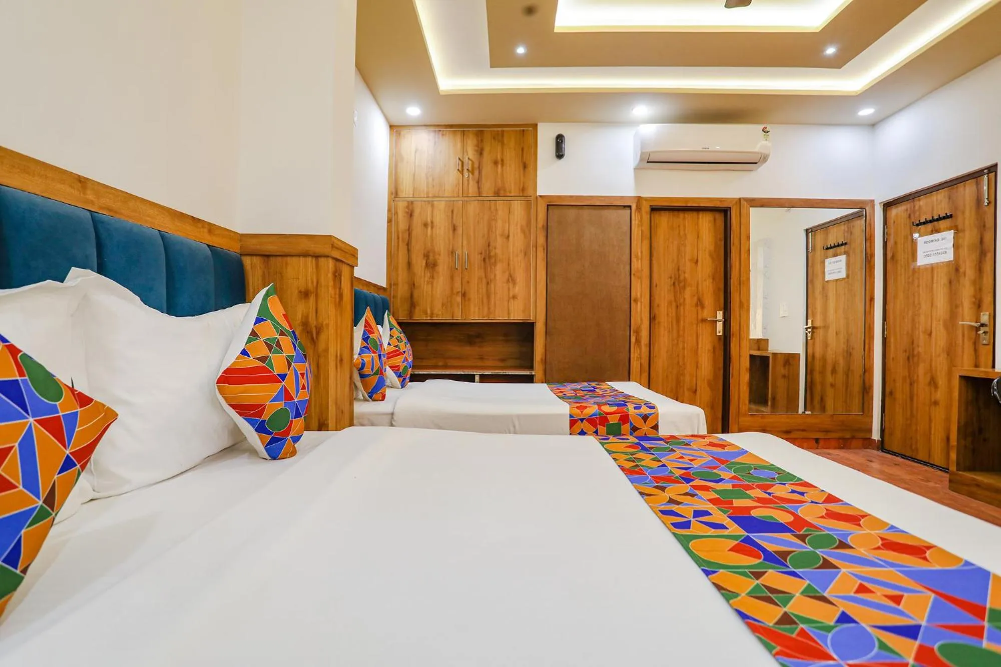 Bed in FabHotel Aaradhya Residency