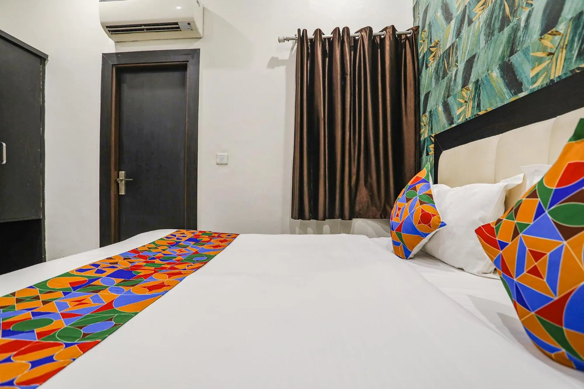 Bed in FabHotel Aaradhya Residency