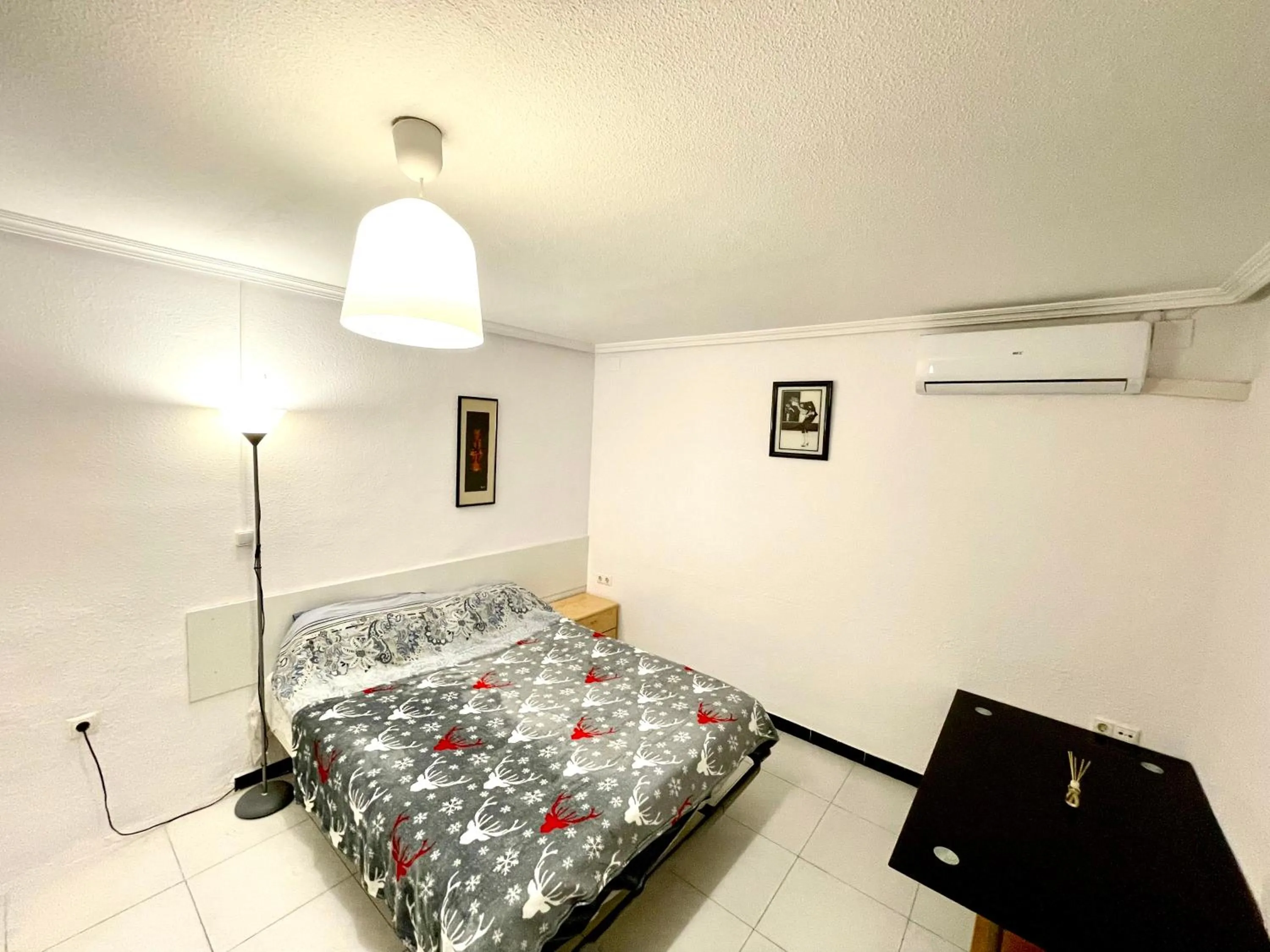 Bed in Las habitaciones en Alicante