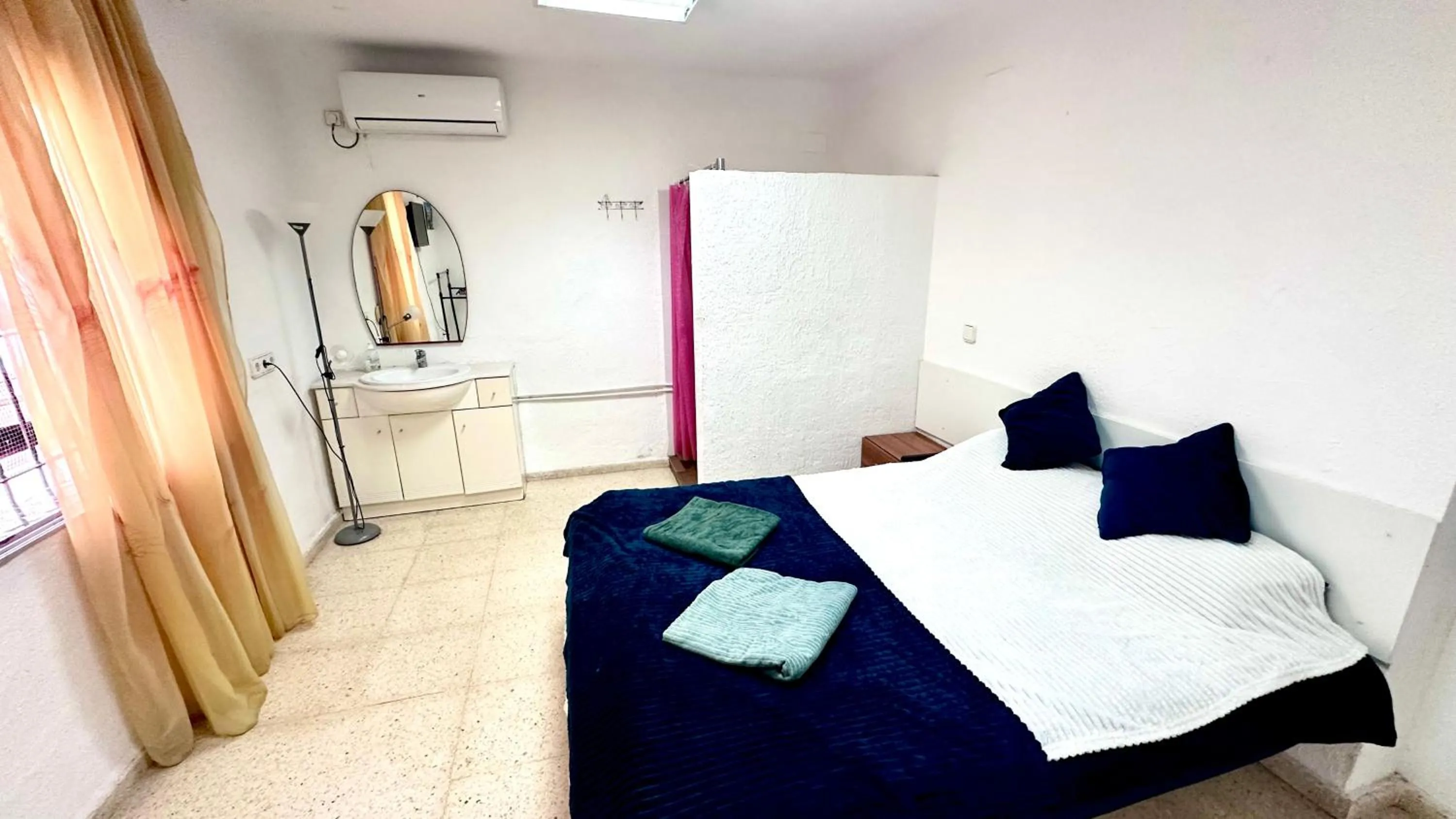 Bed in Las habitaciones en Alicante