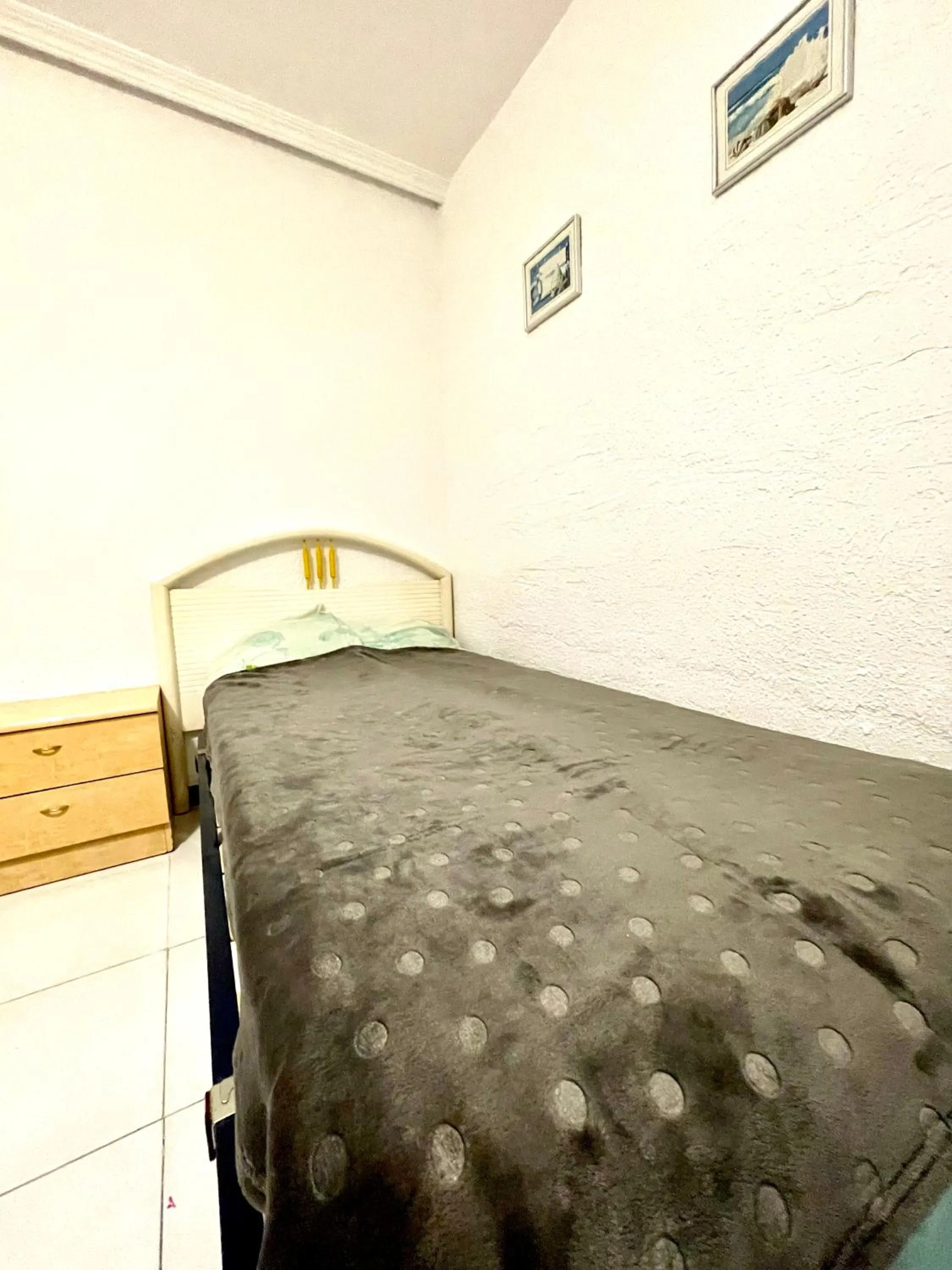 Bed in Las habitaciones en Alicante