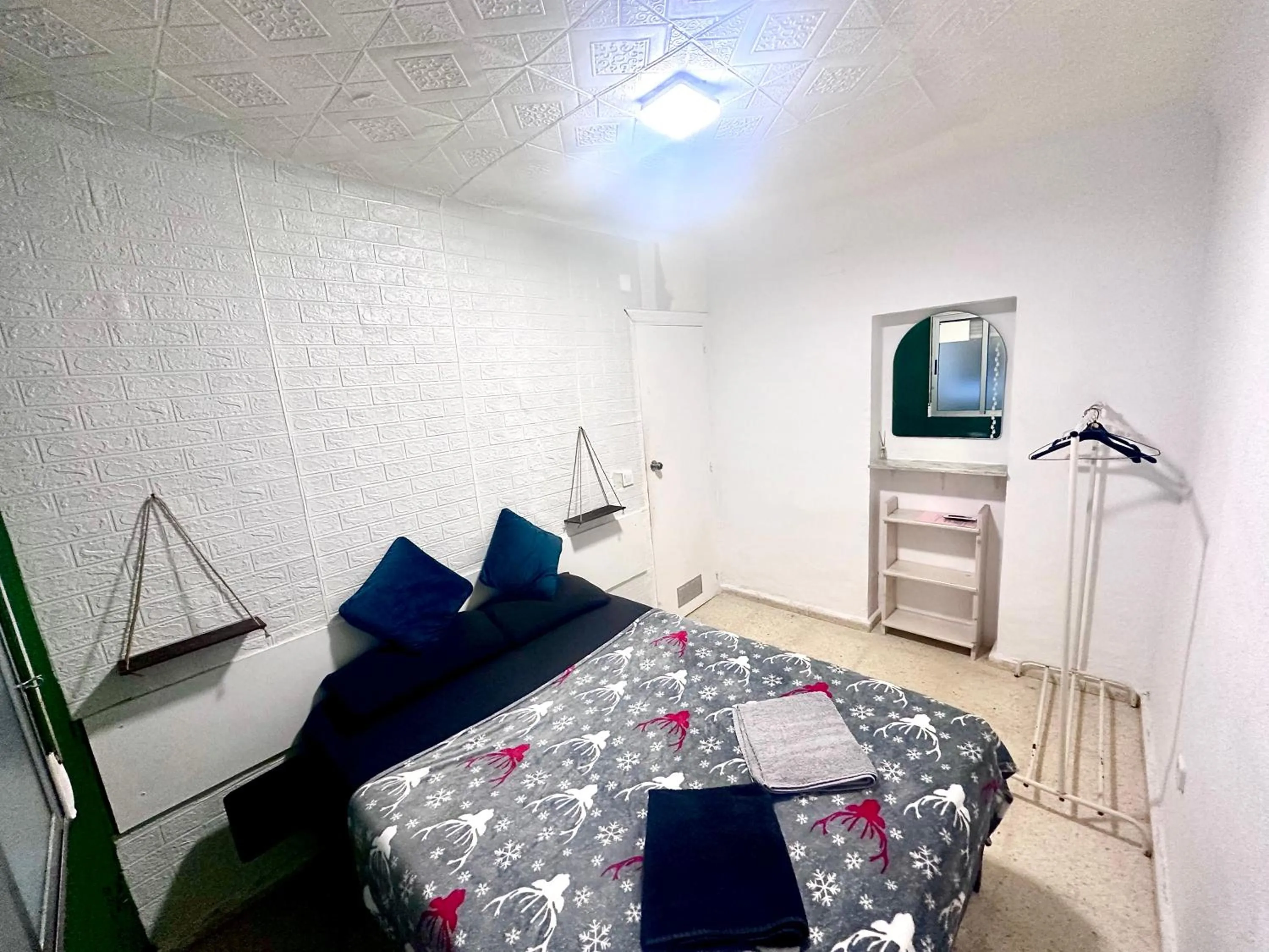 Bed in Las habitaciones en Alicante