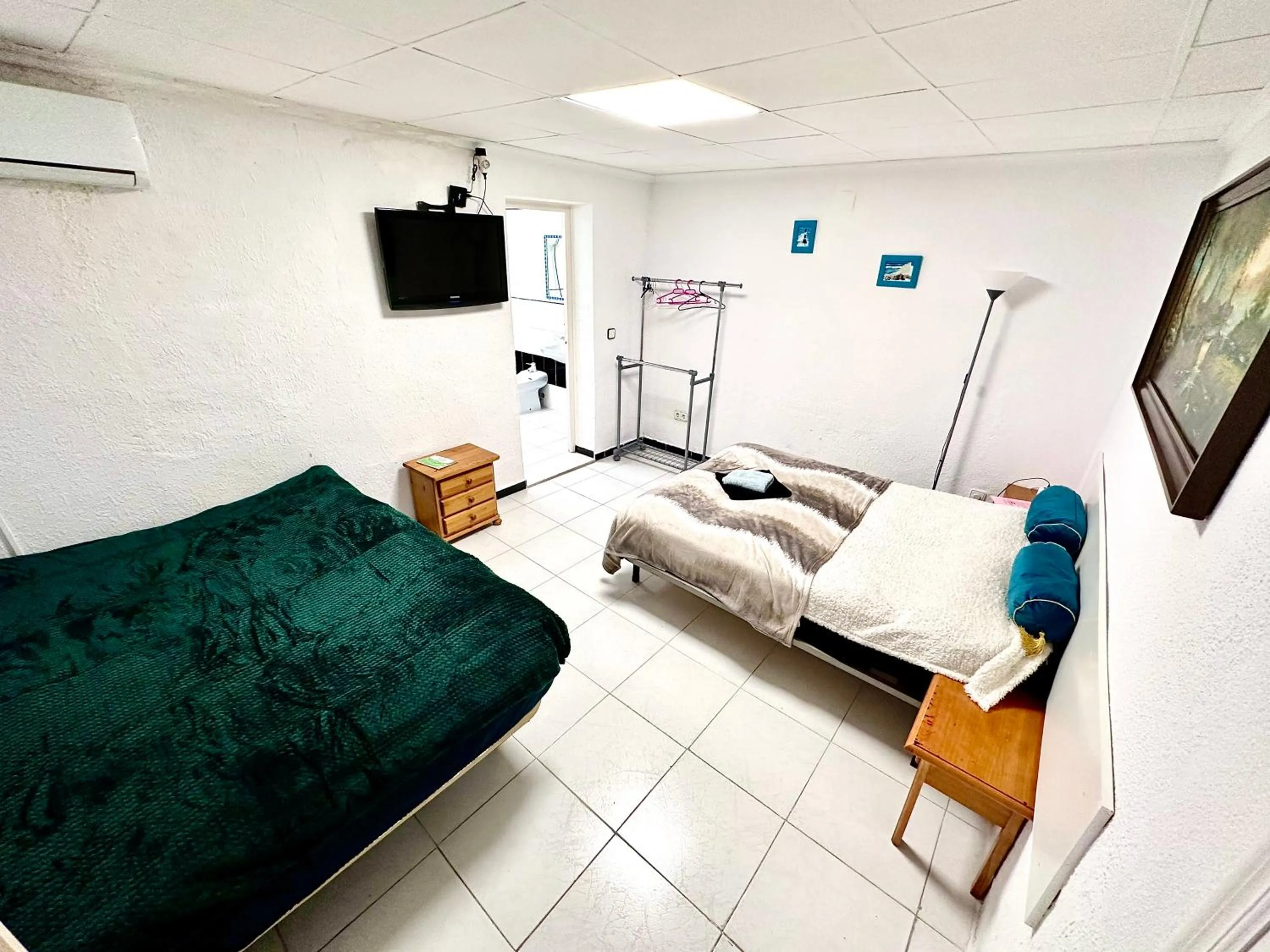 Bed in Las habitaciones en Alicante