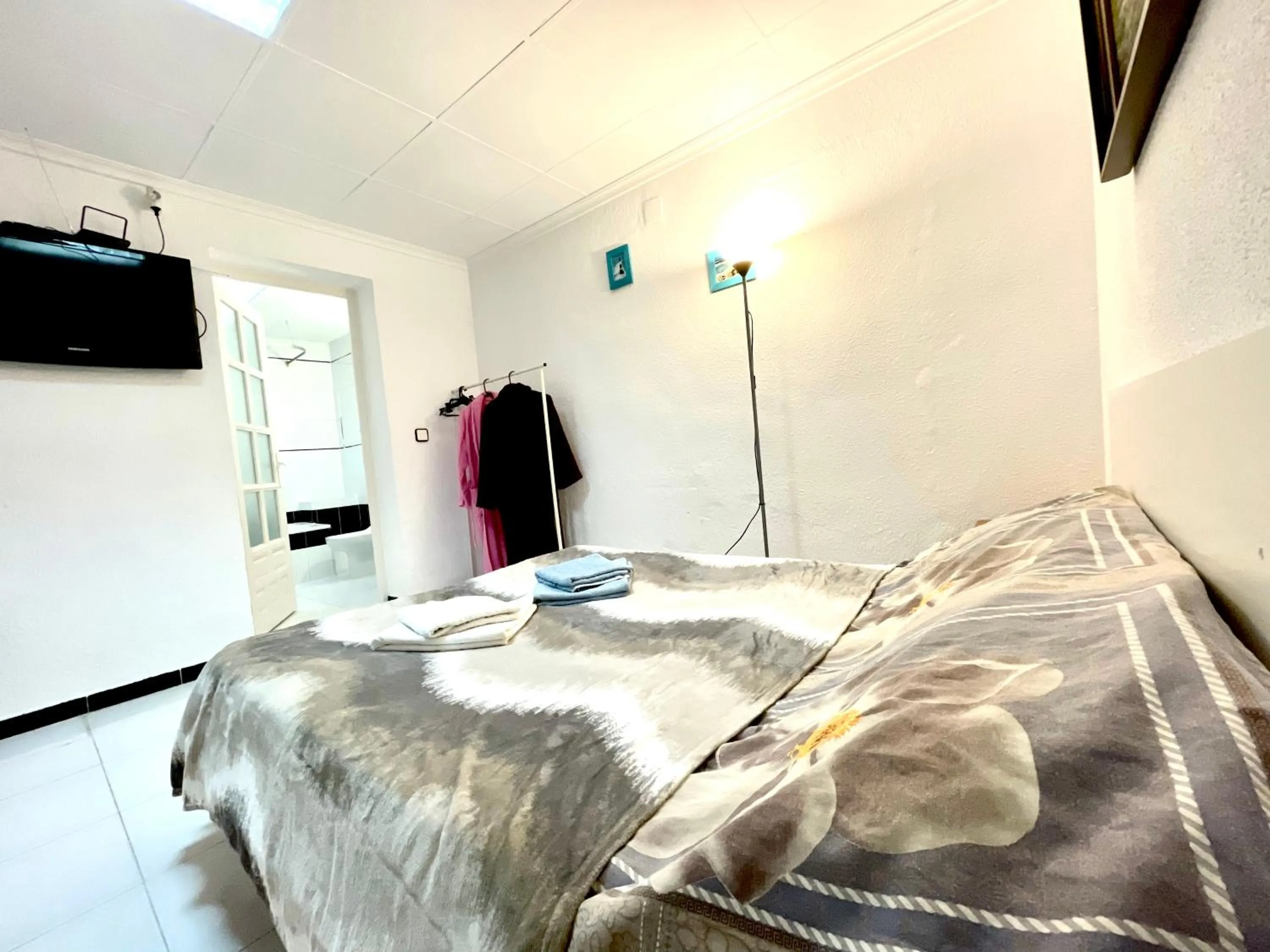 Bed in Las habitaciones en Alicante