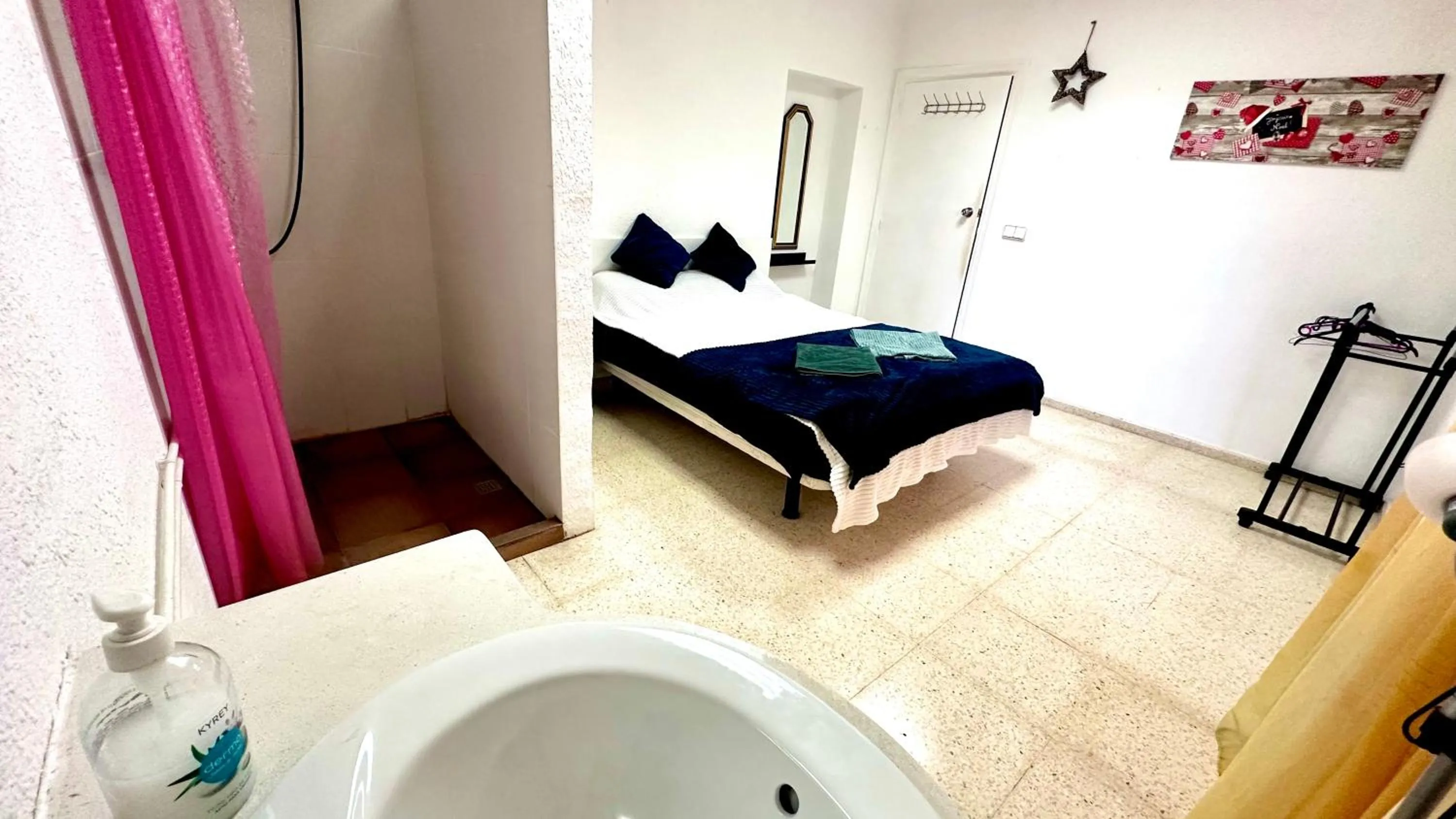 Bed in Las habitaciones en Alicante