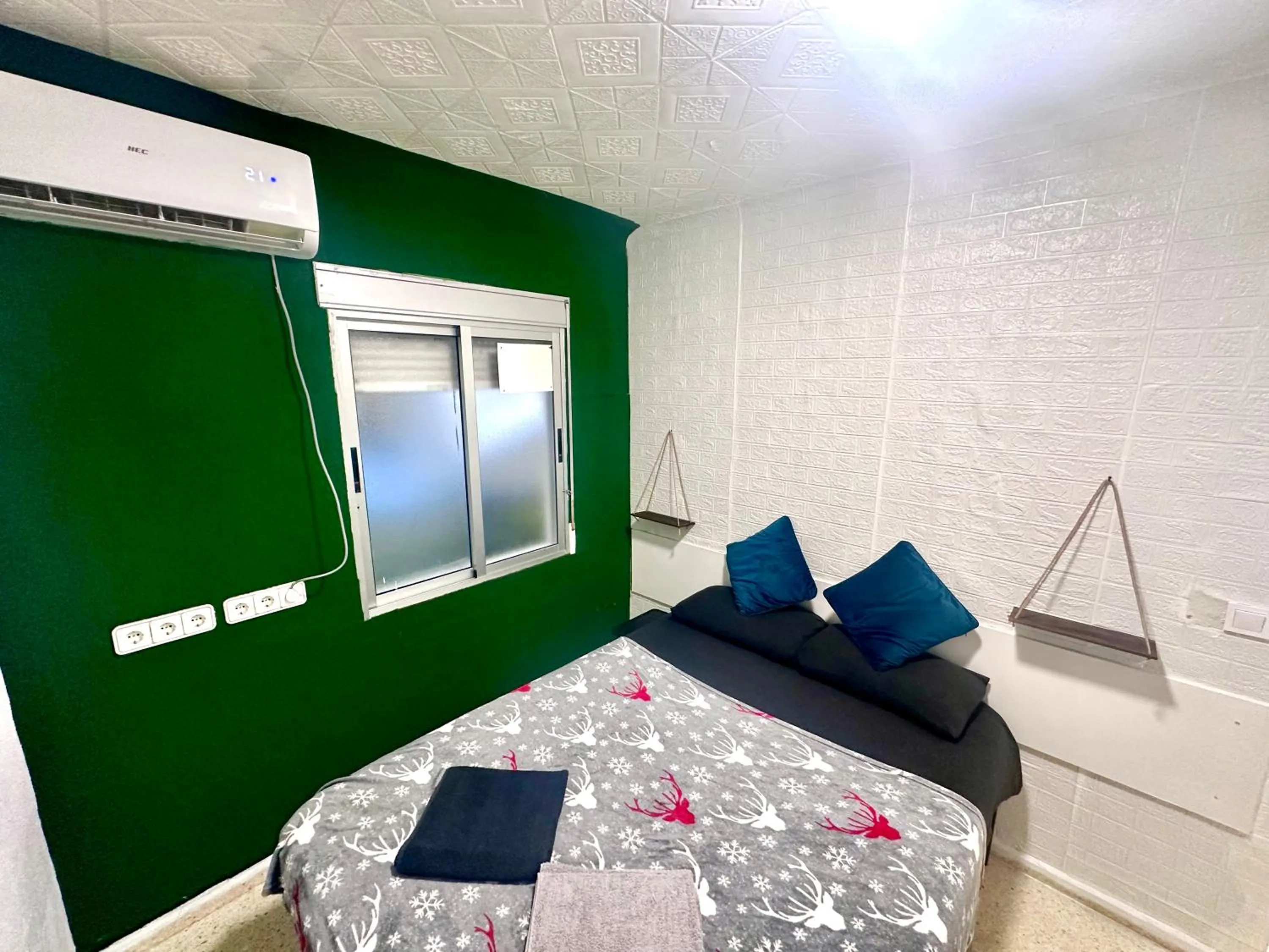 Bed in Las habitaciones en Alicante