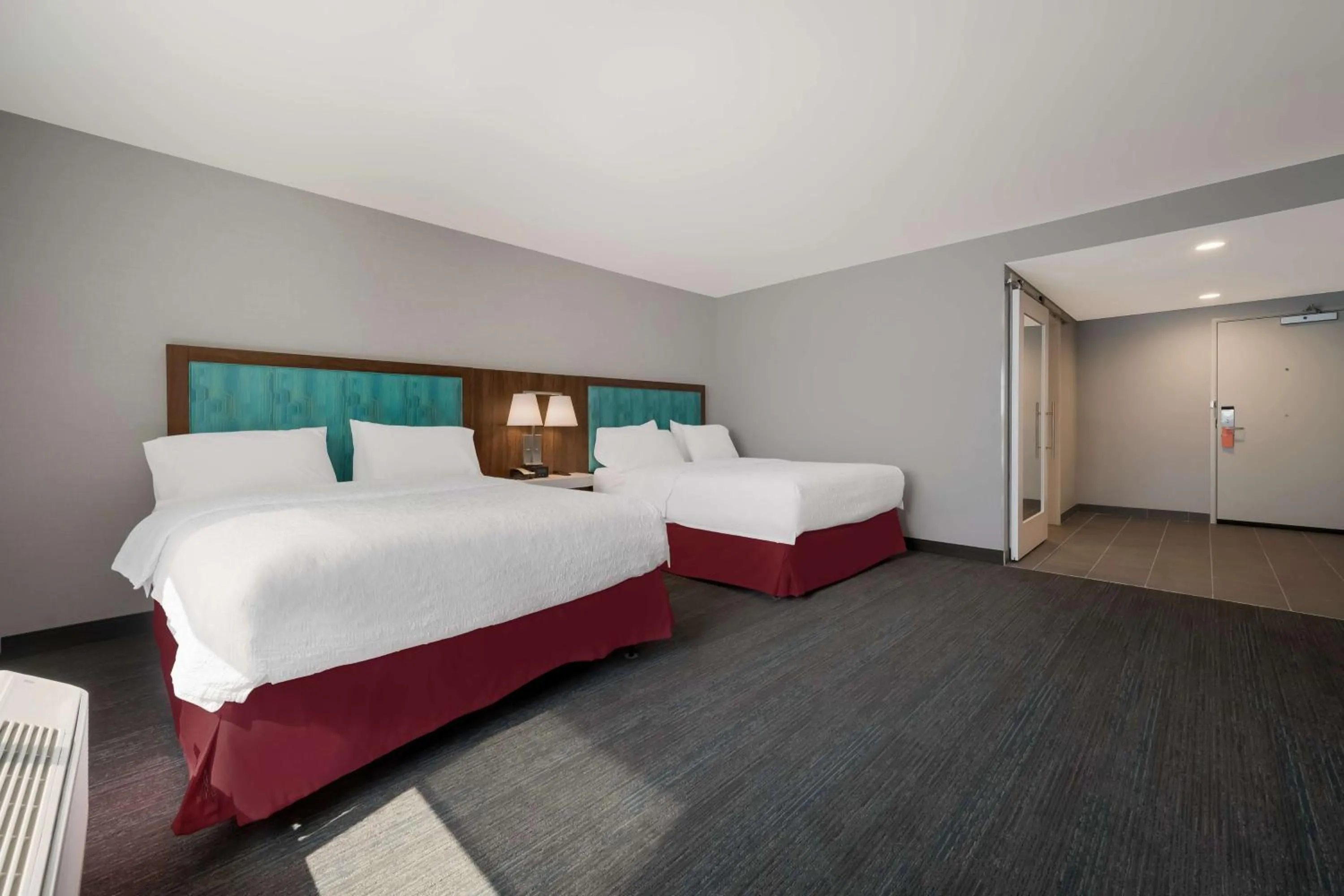Bed in Hampton Inn by Hilton Detroit Southfield