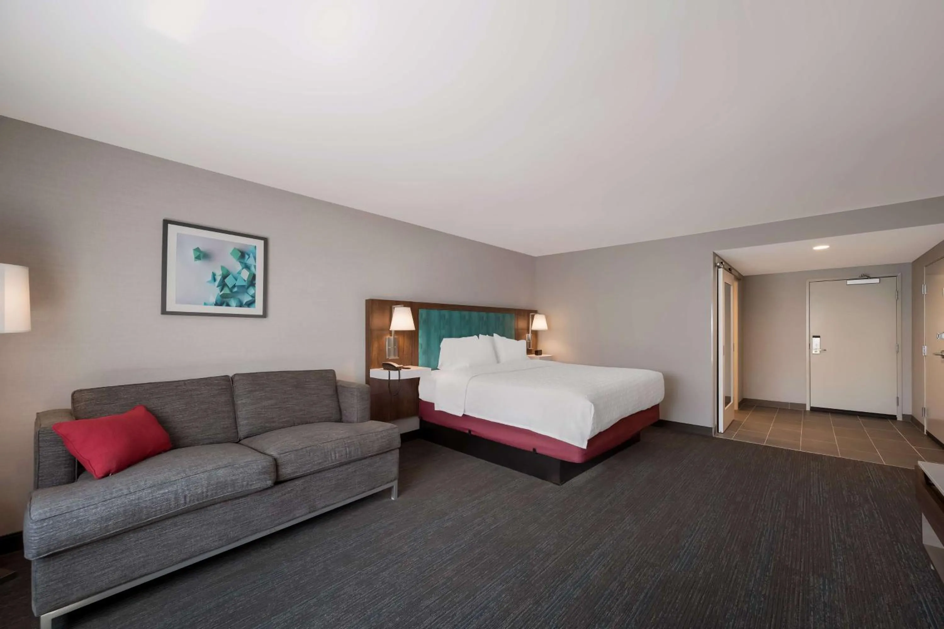 Living room, Bed in Hampton Inn by Hilton Detroit Southfield