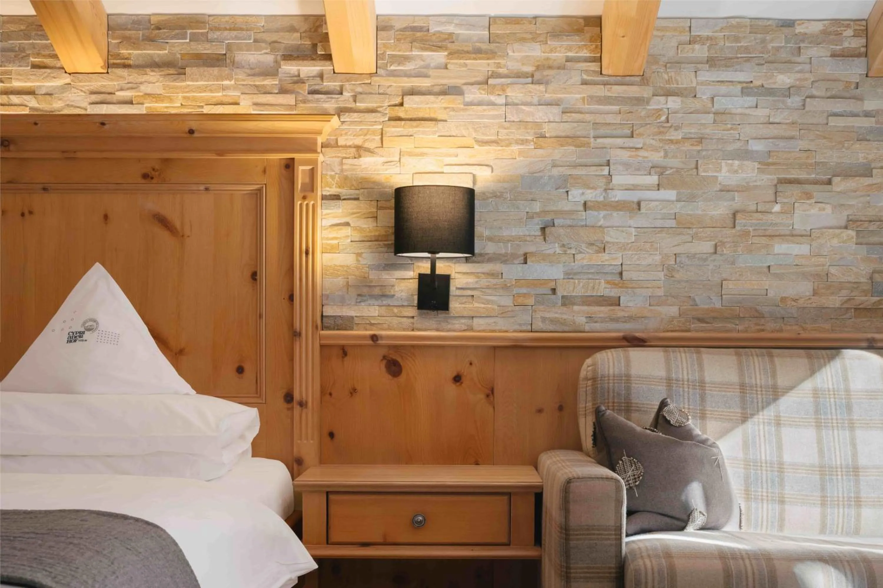 Photo of the whole room, Bed in Cyprianerhof Dolomit Resort